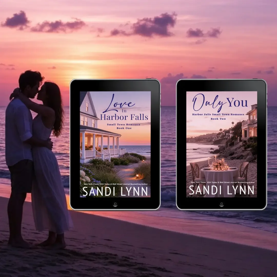 A romantic couple standing on the beach at sunset, backlit by the colorful sky, with two e-readers displaying book covers for romantic novels by Sandi Lynn, titled 'Love in Harbor Falls' and 'Only You.'