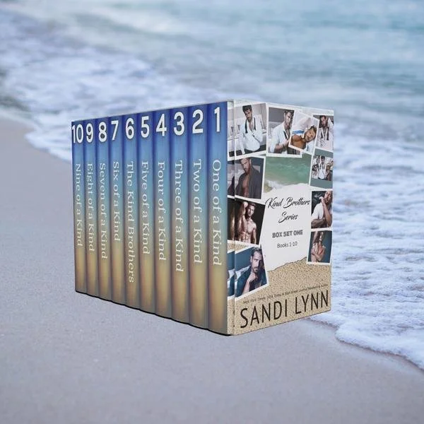 A box set of 10 books titled 'Kind Brothers Series' by Sandi Lynn, standing on a sandy beach with the ocean in the background. The books are numbered 1 through 10.