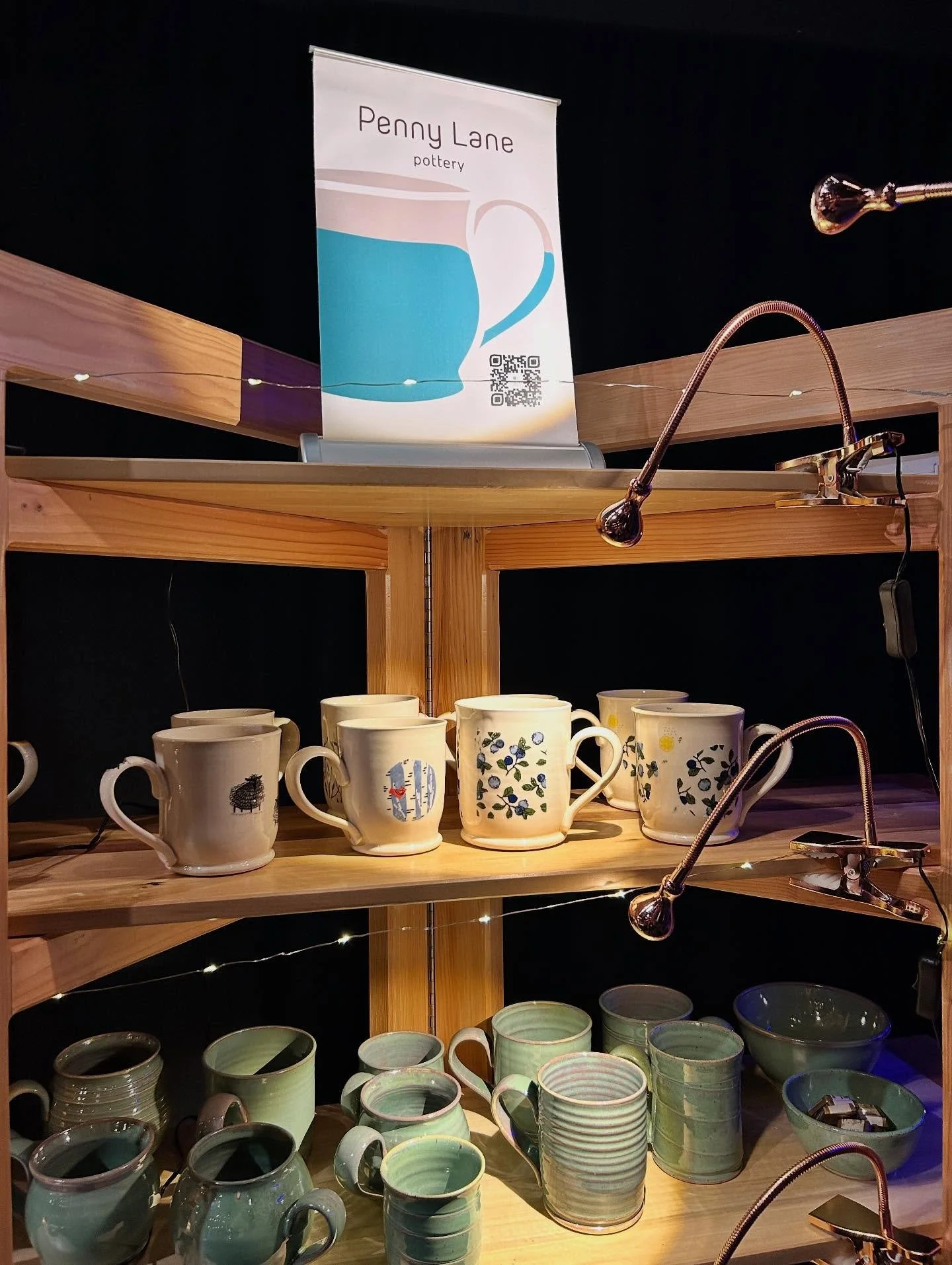 All ready for @evergreen.artisan.market. Got my new booth mascot from @poppy_and_partridgeberry and some mugs for sale. Come to the @earawlinsoncentreforthearts and @mannartgallery for Evergreen this year!! Tonight and tomorrow!!!