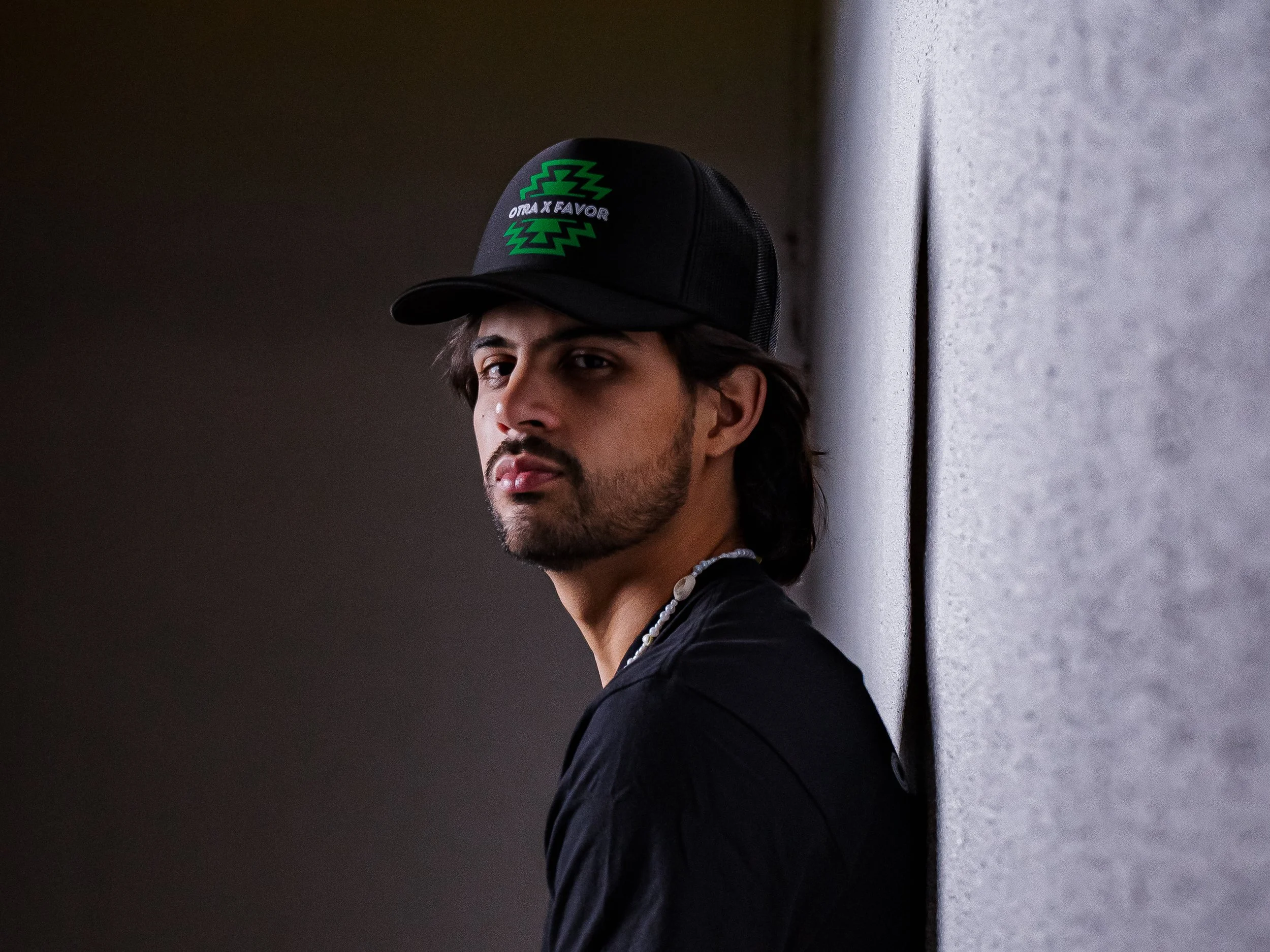 Otra X Favor Trucker Hat Logo