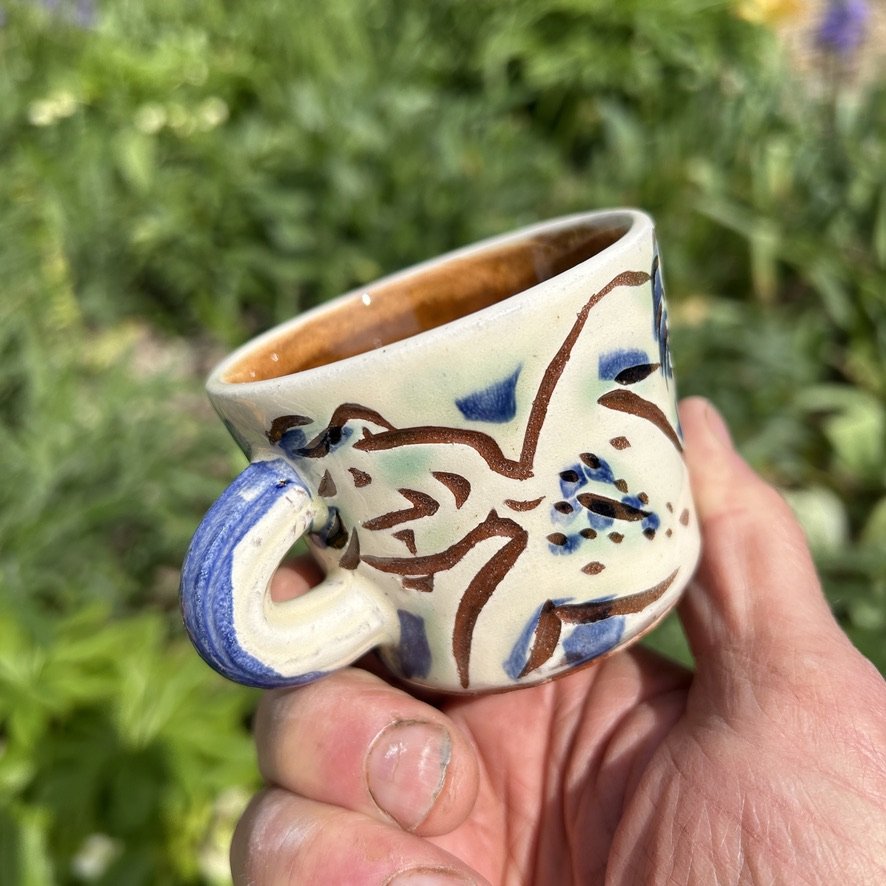 pot2850 Espresso mug with 3 fellas
