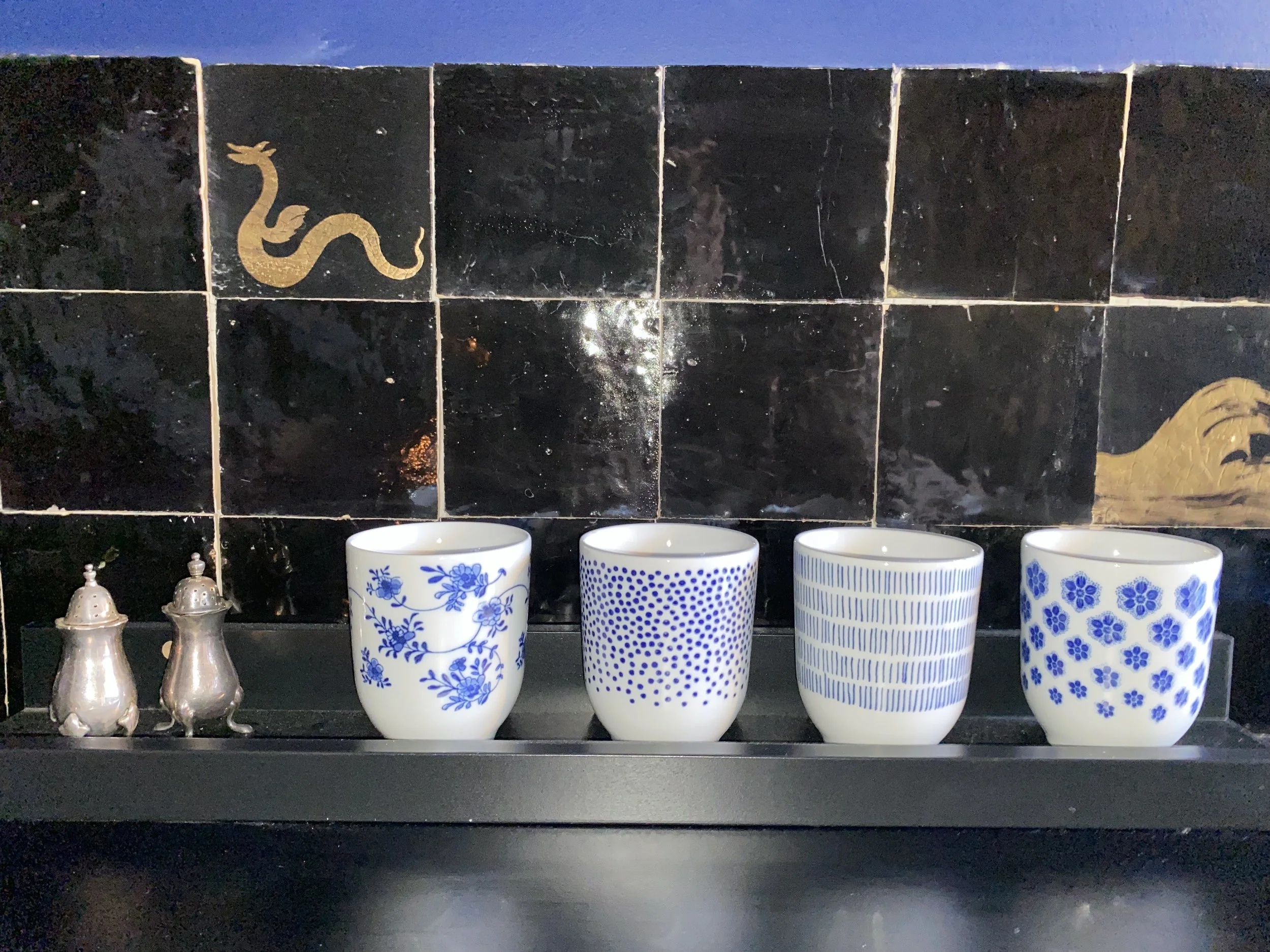 Kitchen detail with patterned ceramics.