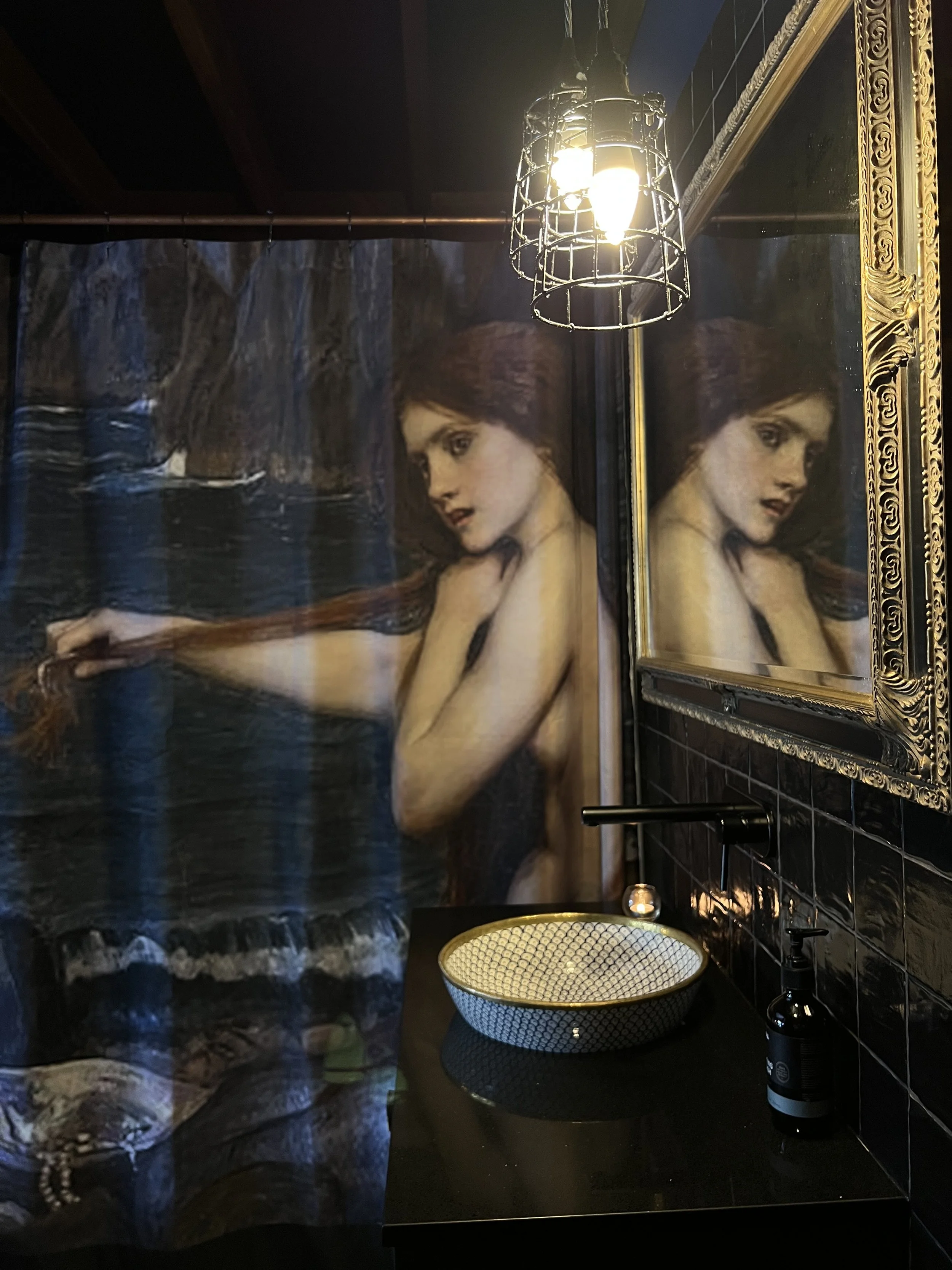 A magnificent bathroom awaits you. The beautiful mermaid masterpiece is glorious in the sumptuous and sexy space.