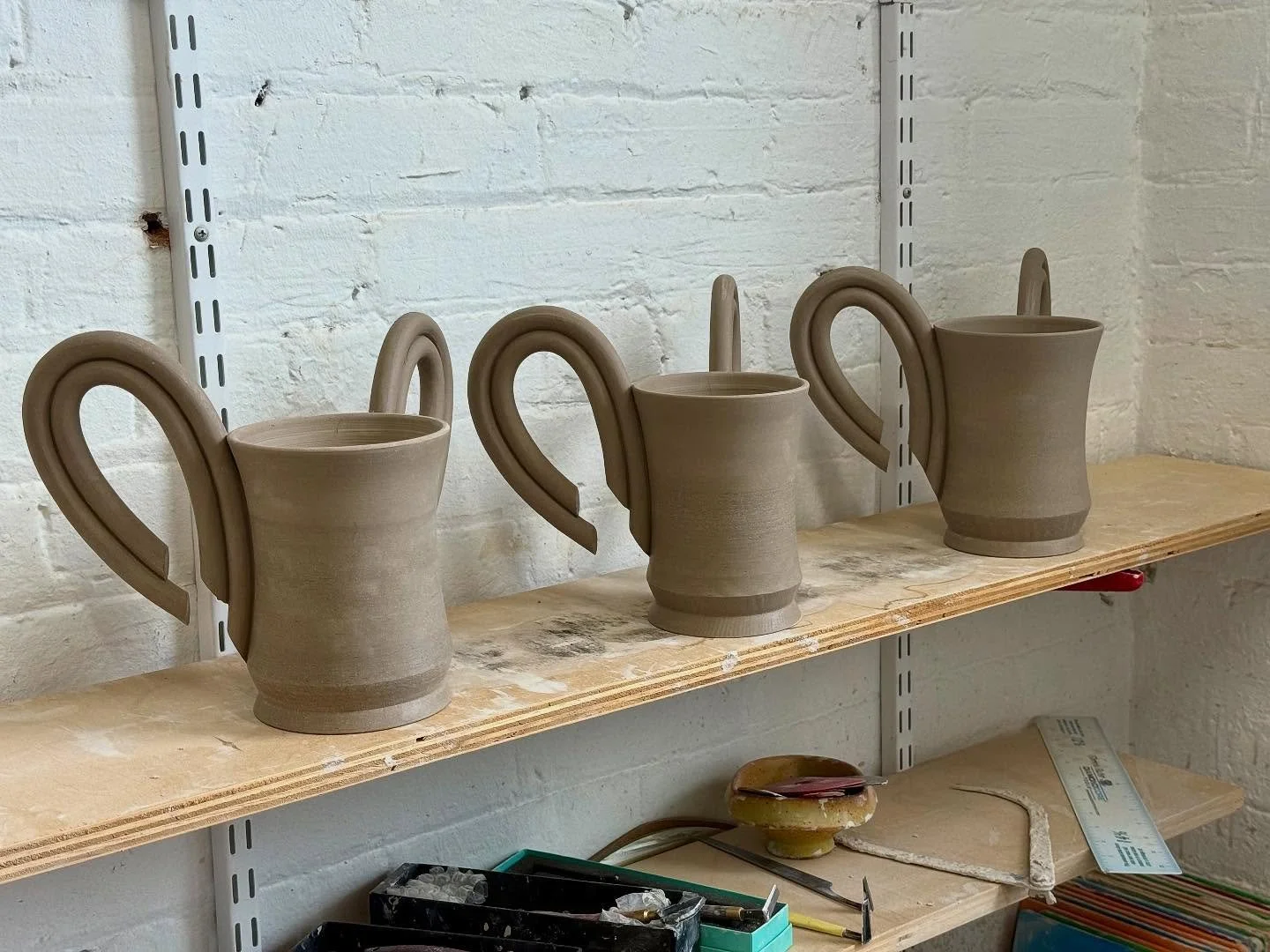 Making some custom washing cups for and deciding on exact handle profile. 

The three are slightly different, do you have a preference? I am more privy to the third, a bit more balanced