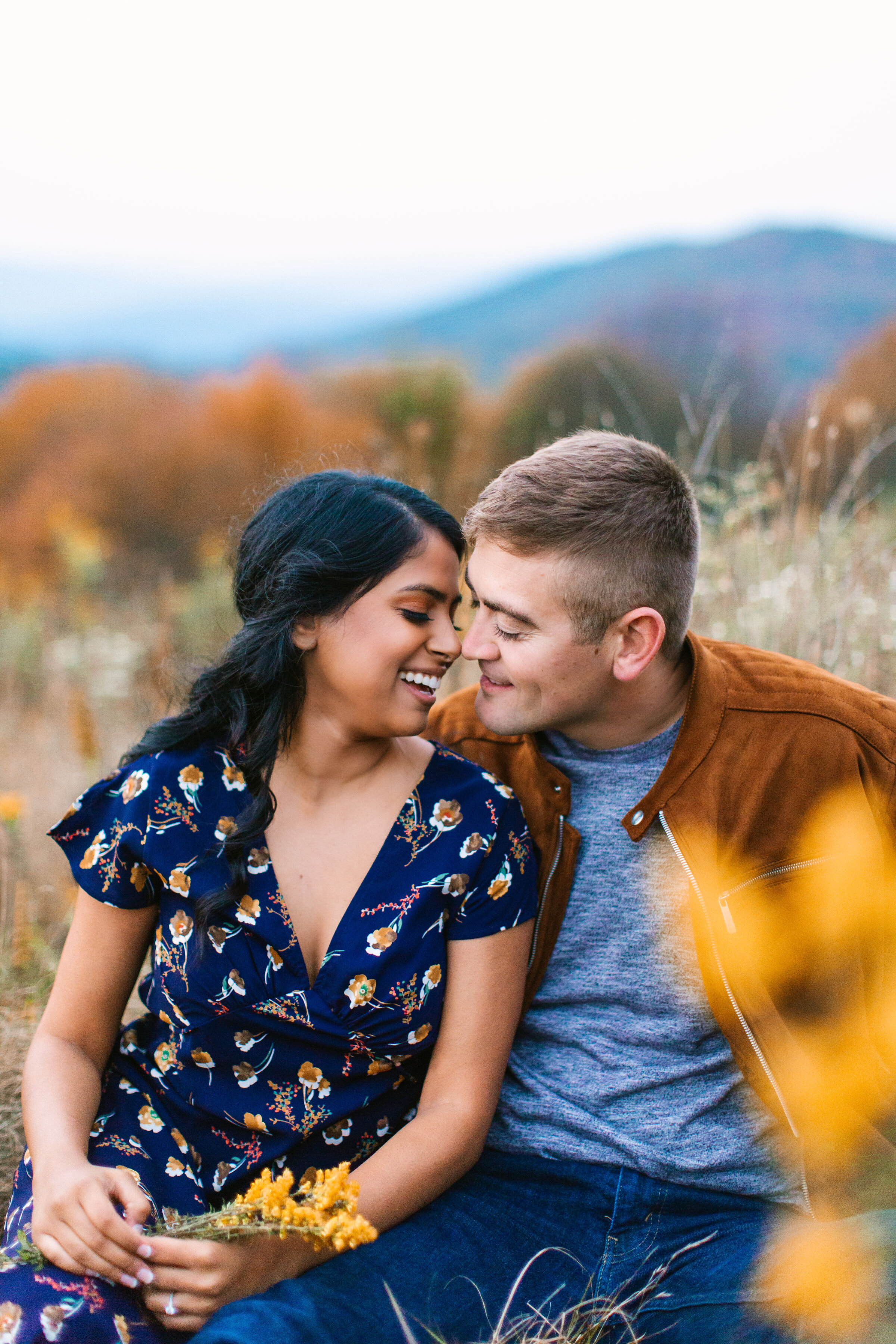 Max Patch Fall Couple Engagement Photos |  Couple sitting in wild flowers