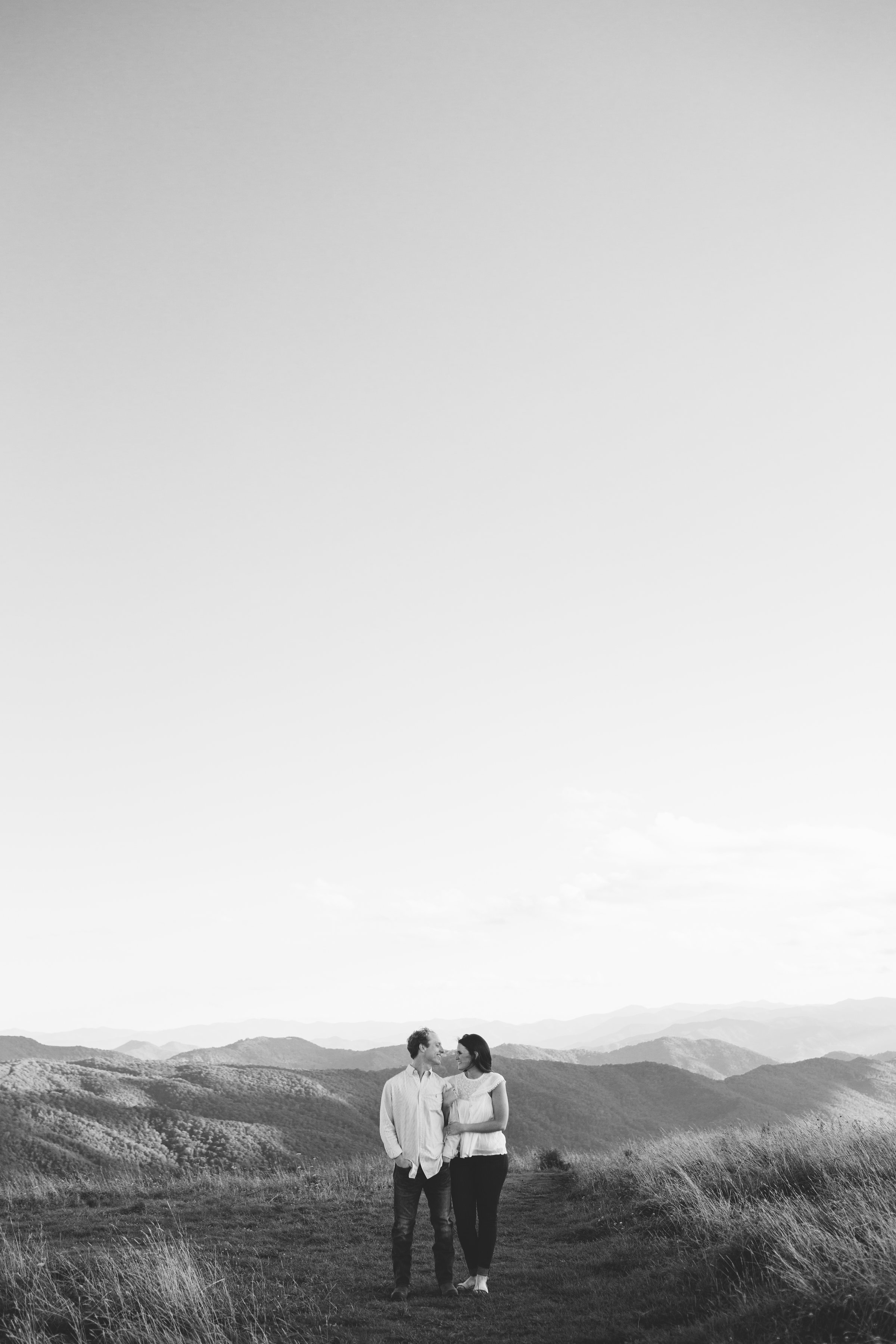Max Patch Summer Engagement Photos on the Mountain at Sunset black and white image