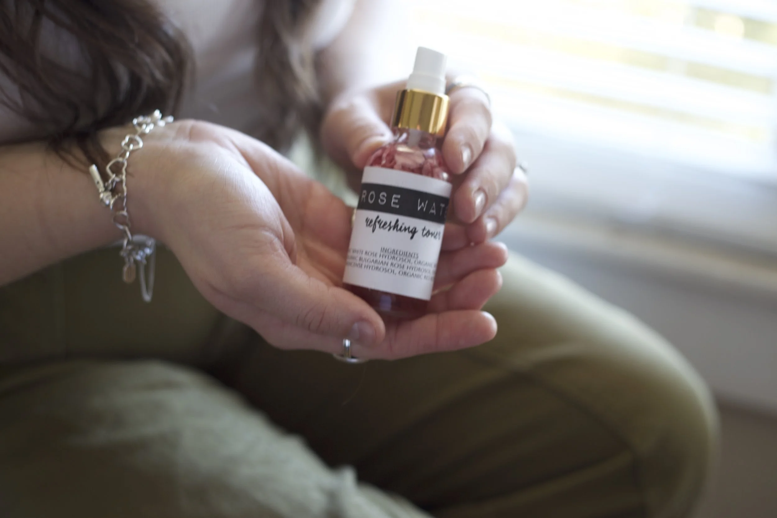 andreelyn hands rose water.jpg