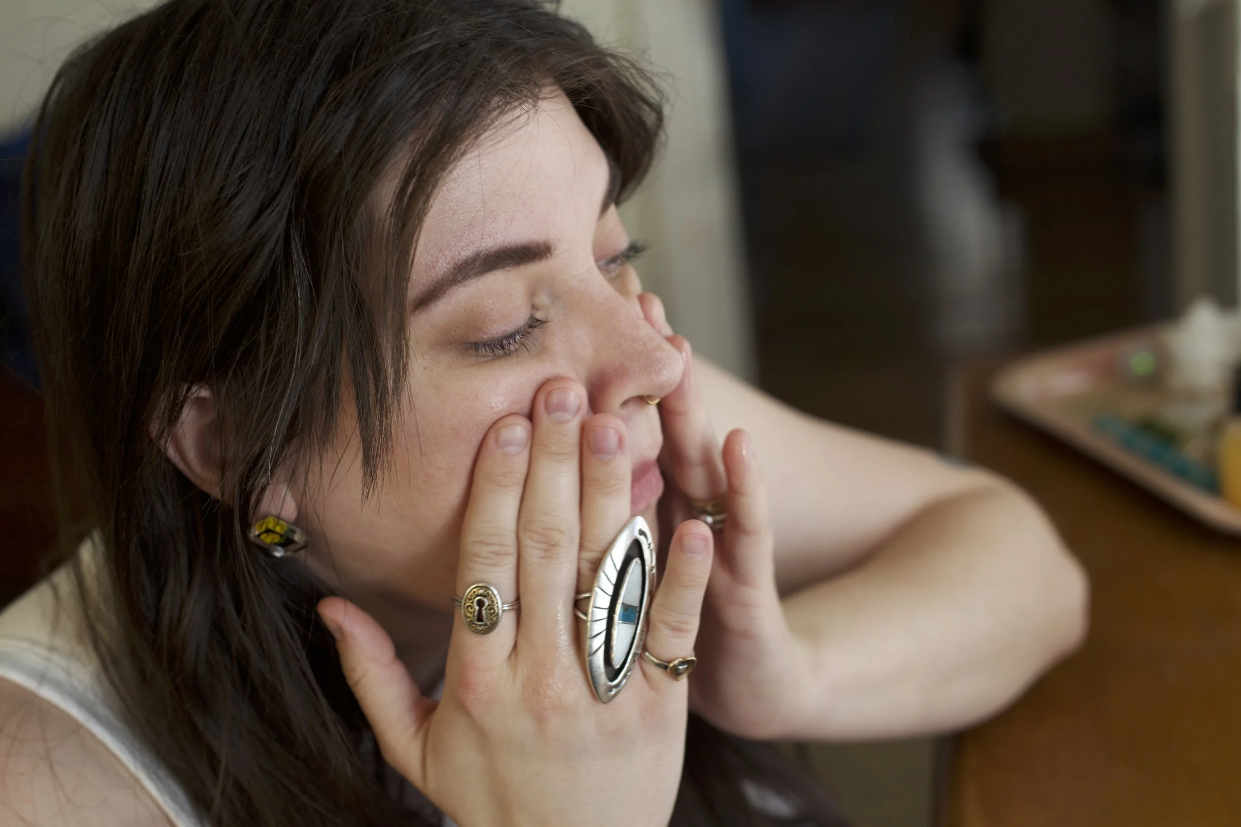 andreelyn patting face.jpg