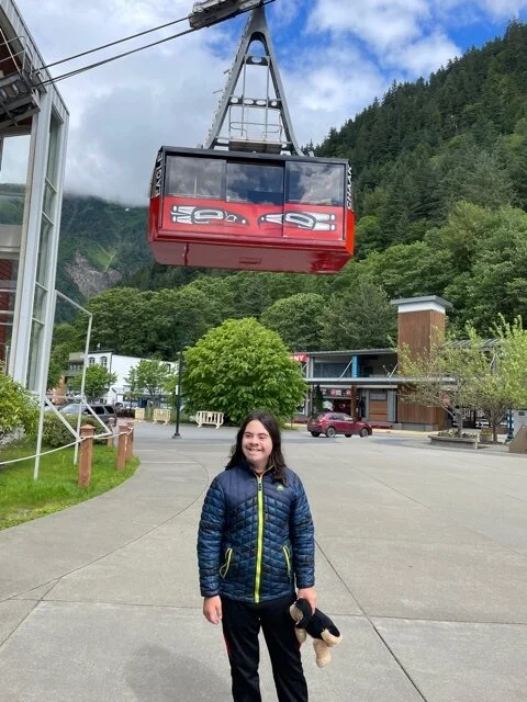 Kai about to take tram up mountain behind Juneau