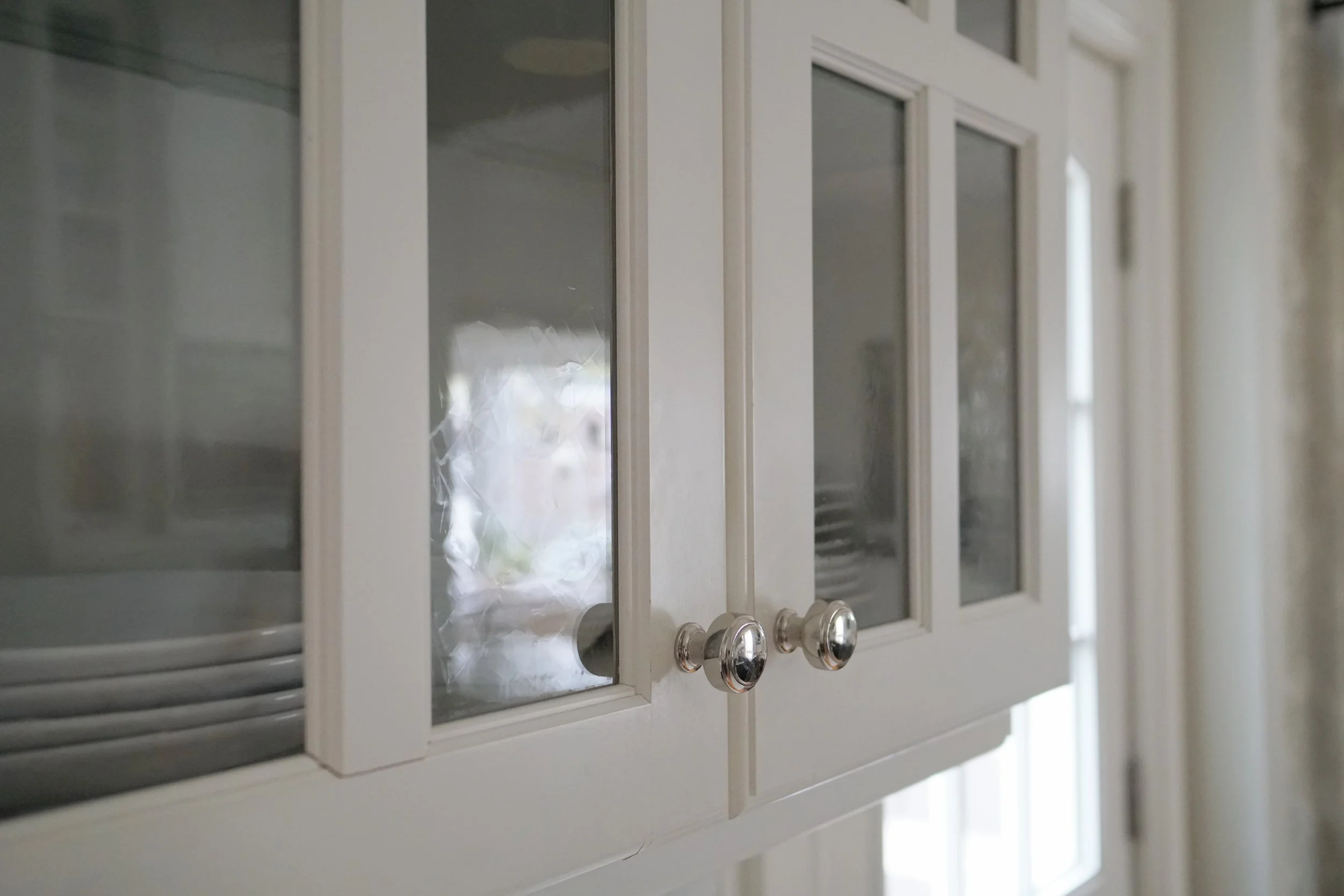Textured glass front French door upper cabinet - Cheryl Lee Interiors 
