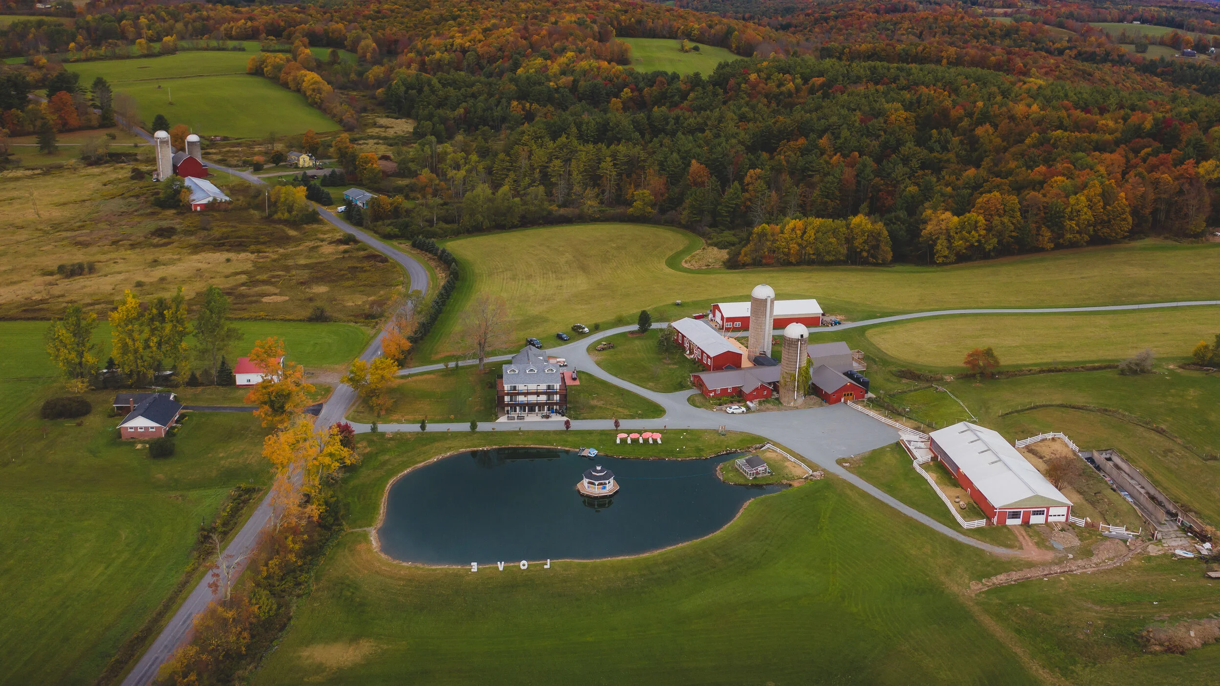 Outdoor Aerial Views of Gilbertsville Farmhouse, New York's Premier