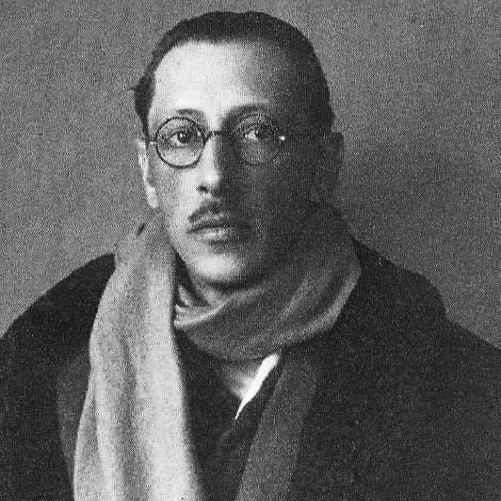 Vintage black and white photograph of composer Igor Stravinsky wearing a scarf.