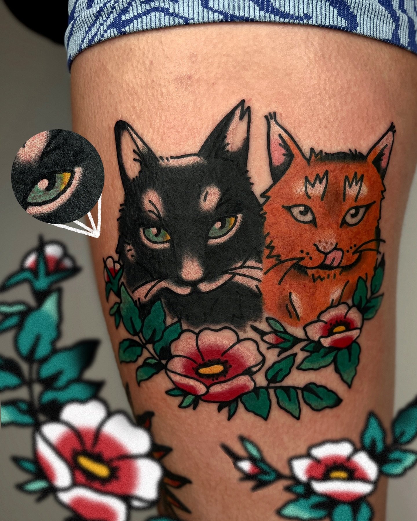 a pair of custom cat portraits framed with wild roses 🐈 🐈&zwj;⬛ thanks to my client for their trust and strength sitting through this big colour piece 🏆 

i work in BRIGHTON @goodcompany.tattoo and my books are open! ⭐️ 

to BOOK A TATTOO use the 
