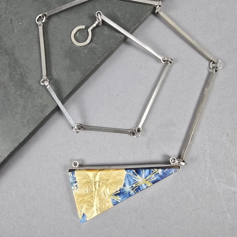bezel-necklace-bridewell-stone-curled.jpg