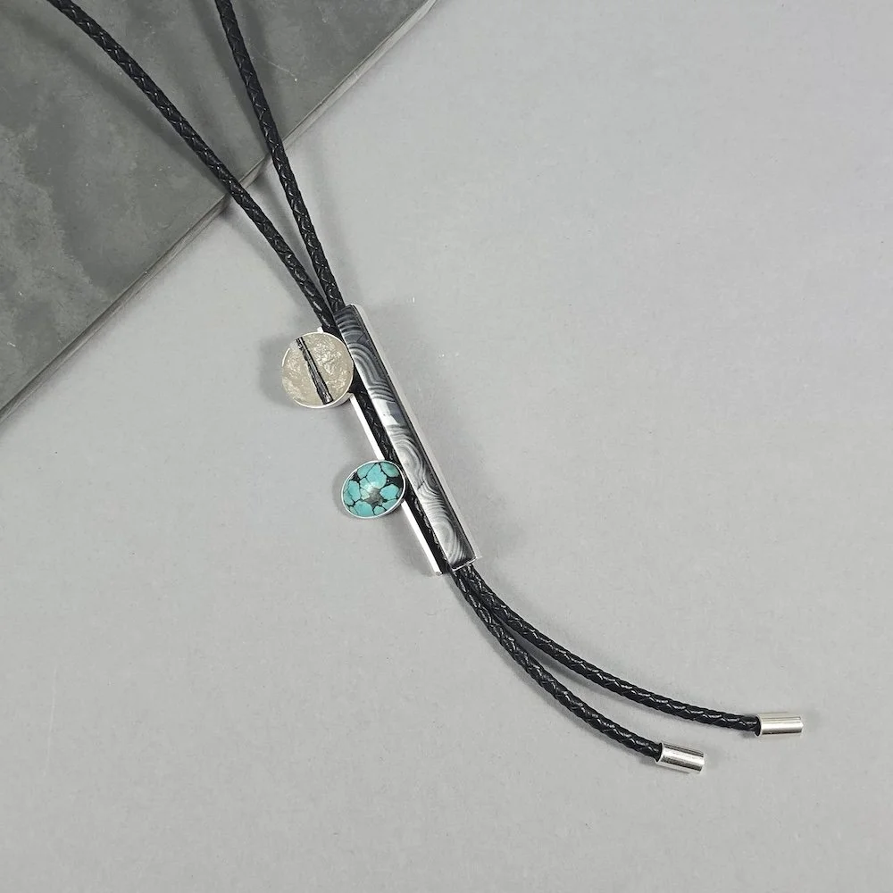 bolo-tie-psilomelane-tourmilated-quartz-turquoise.jpg