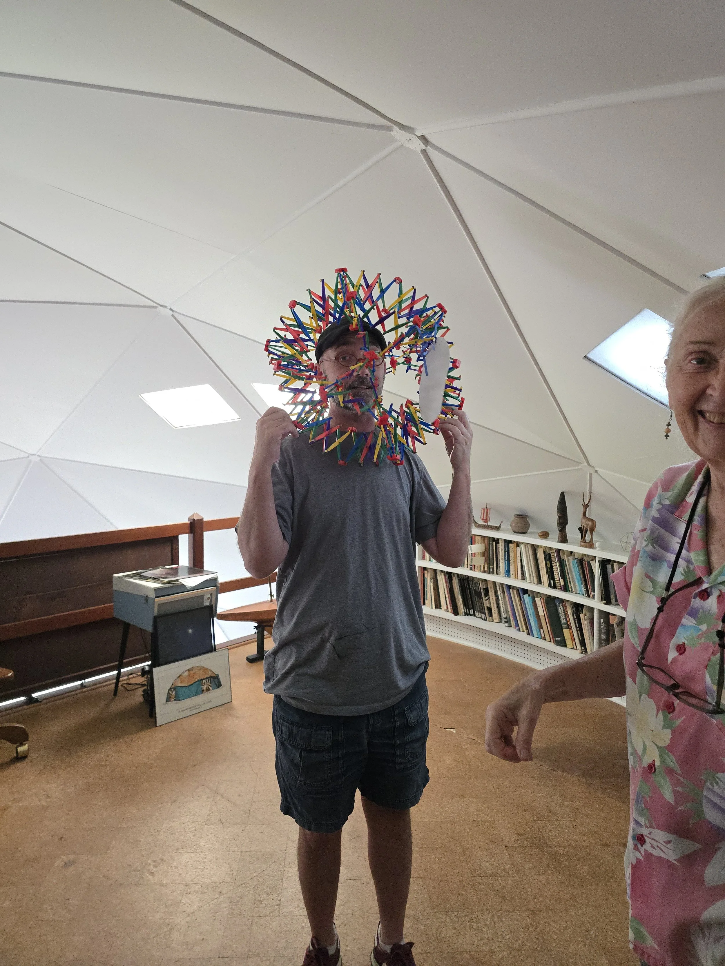Our docent, Judy, made him do it.