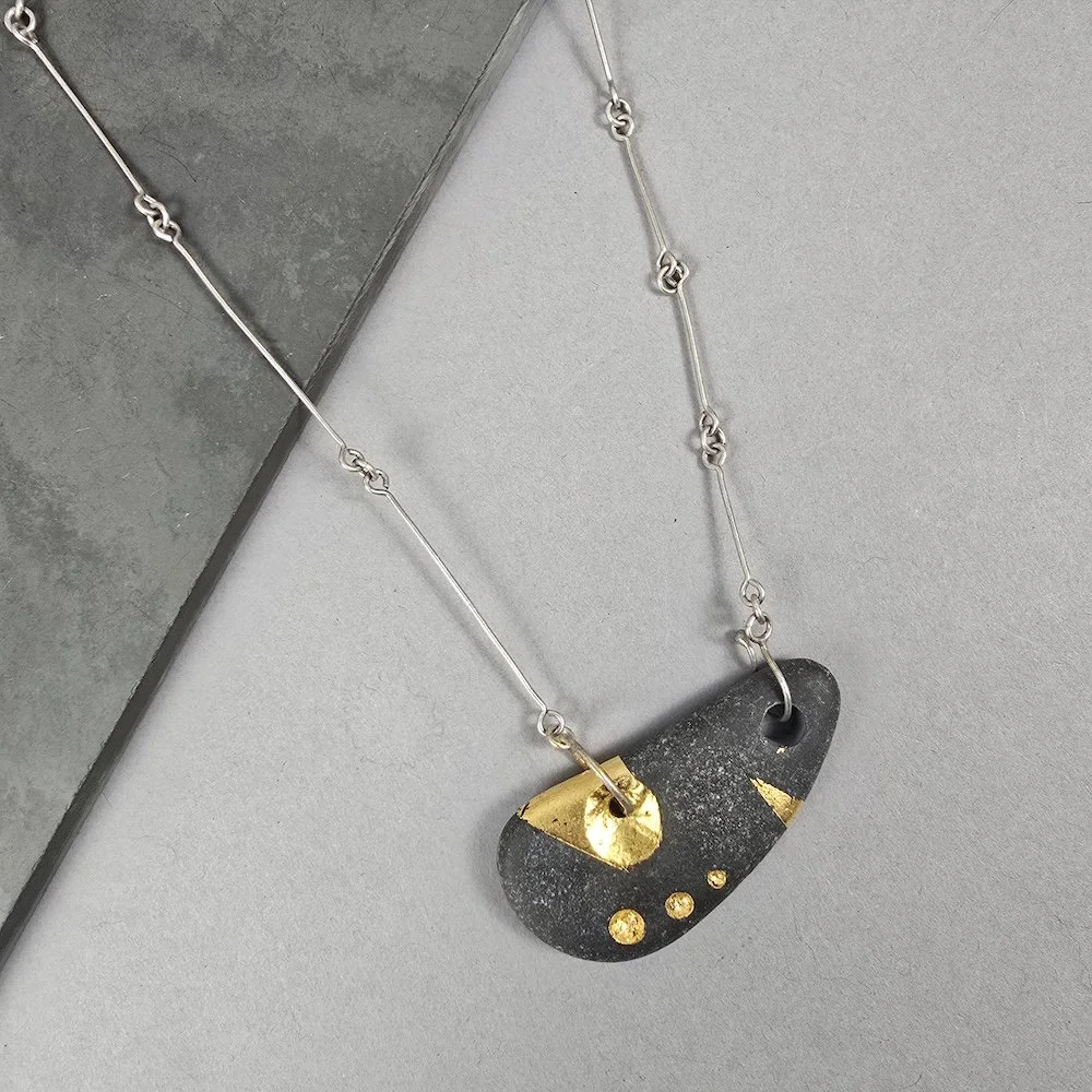 decorated-pebble-necklace-with-24k.jpg