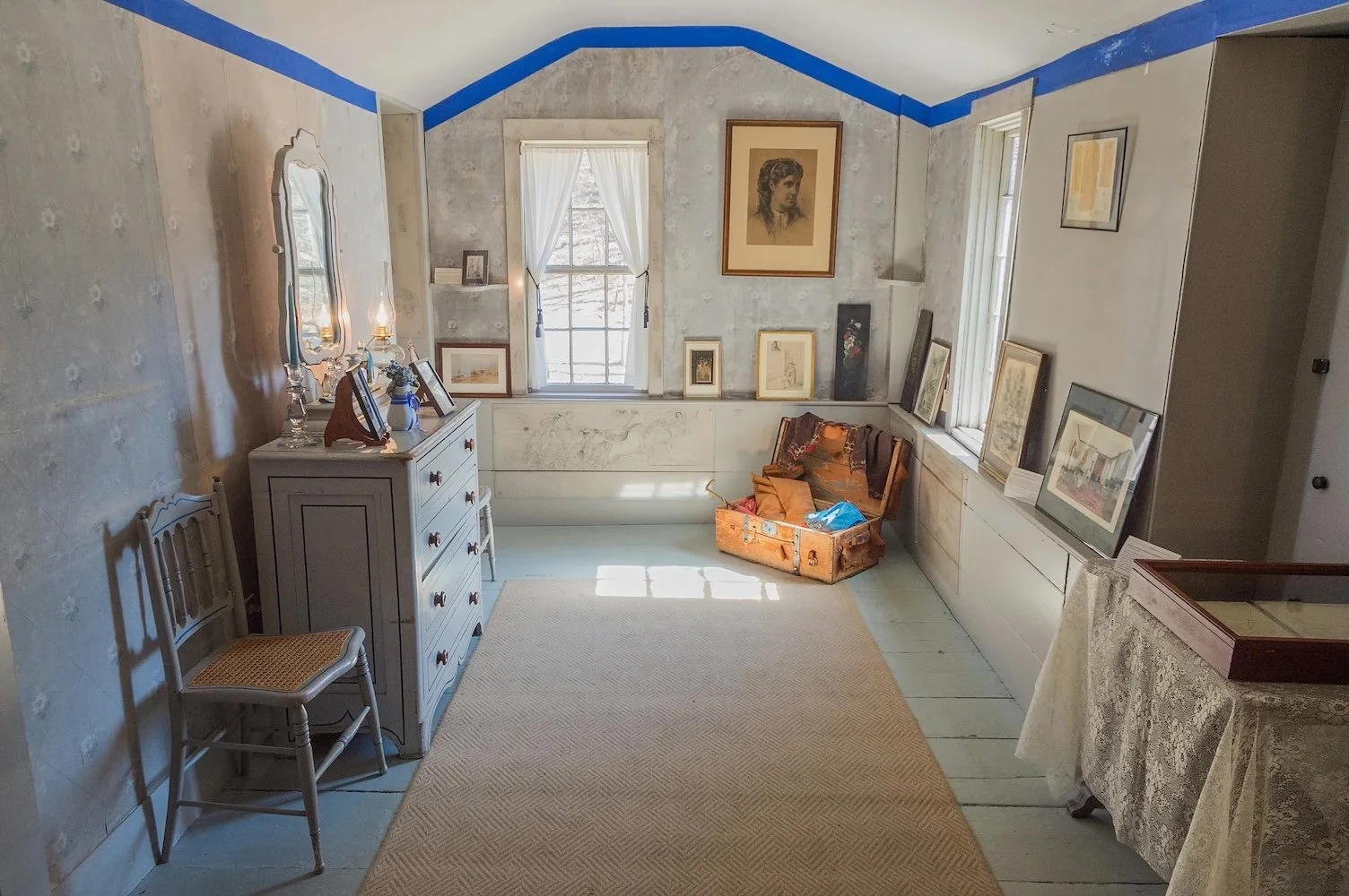 Alcott's bedroom with a blue stripe