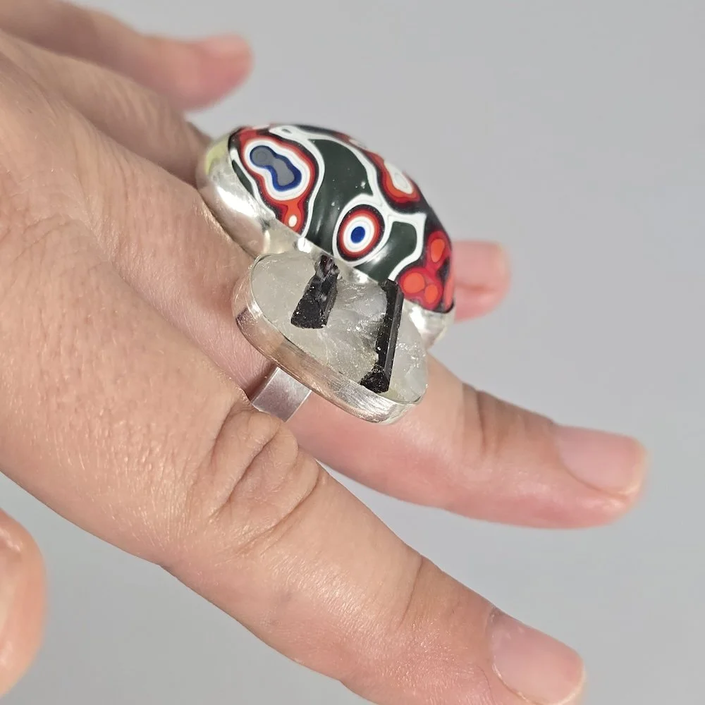 Wraparound Ring with Jeep Fordite and Tourmilated Quartz shown on finger