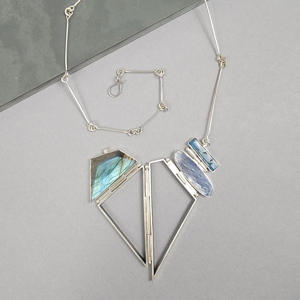 Hinged Pointy Necklace with Labradorite, Kyanite, Gem Silica shown birdseye view.
