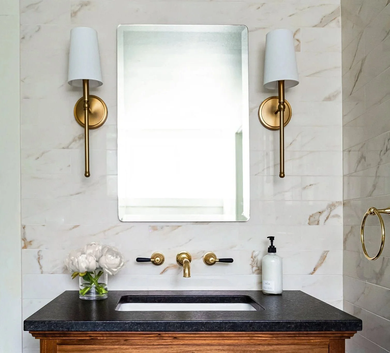 Traditional bathroom renovation with marble tile, custom vanity