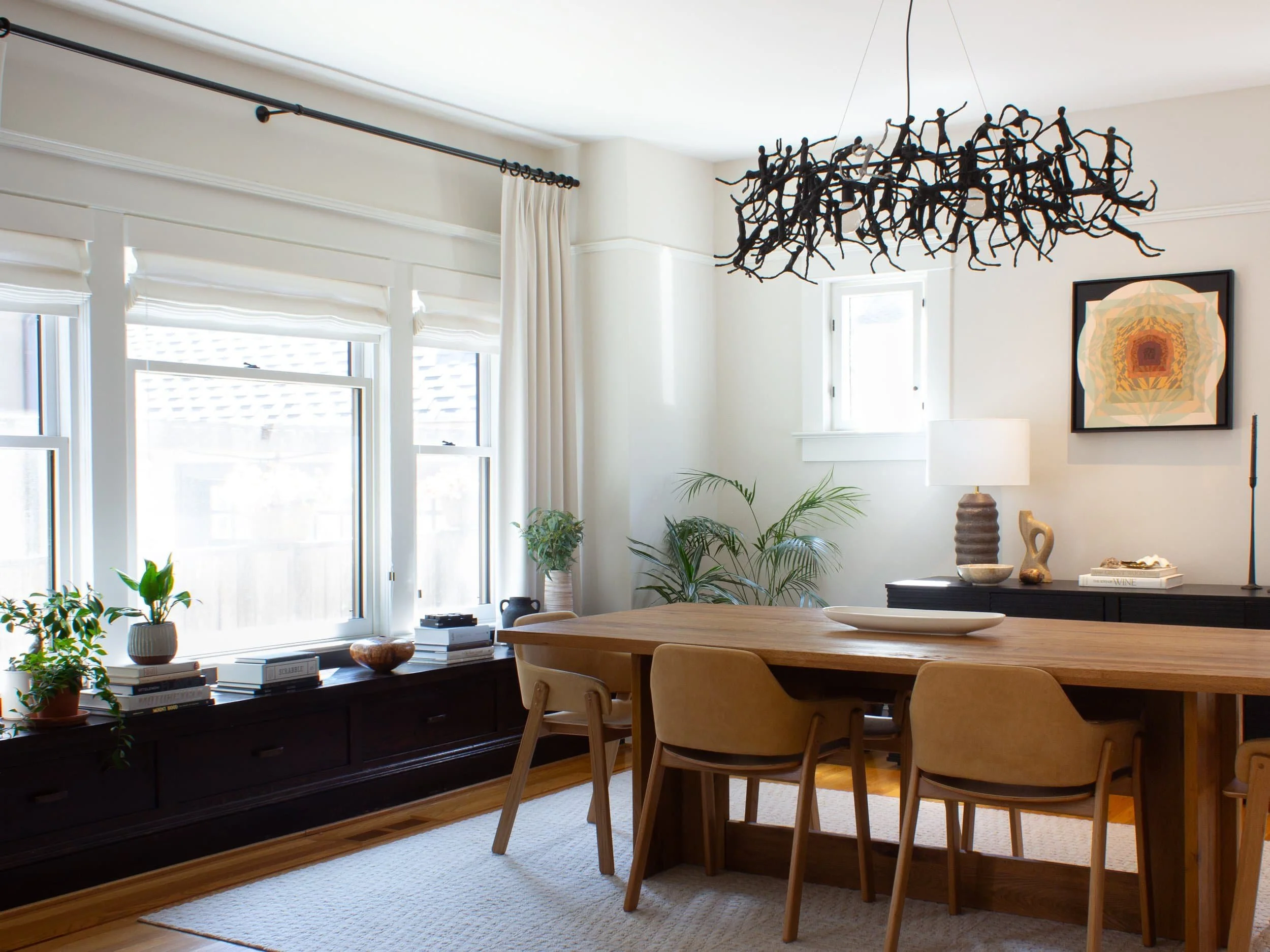 Full-service interior design project in Irvington, NE Portland featuring custom built-ins, dining furniture, and architectural lighting