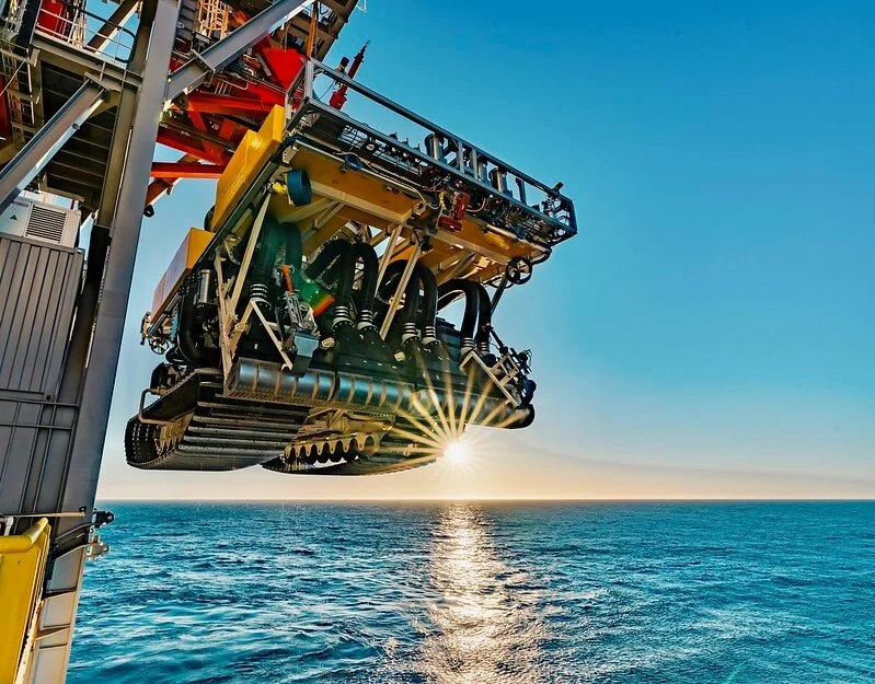Seabed Mining Equipment waiting to be placed in water on a sunny morning
