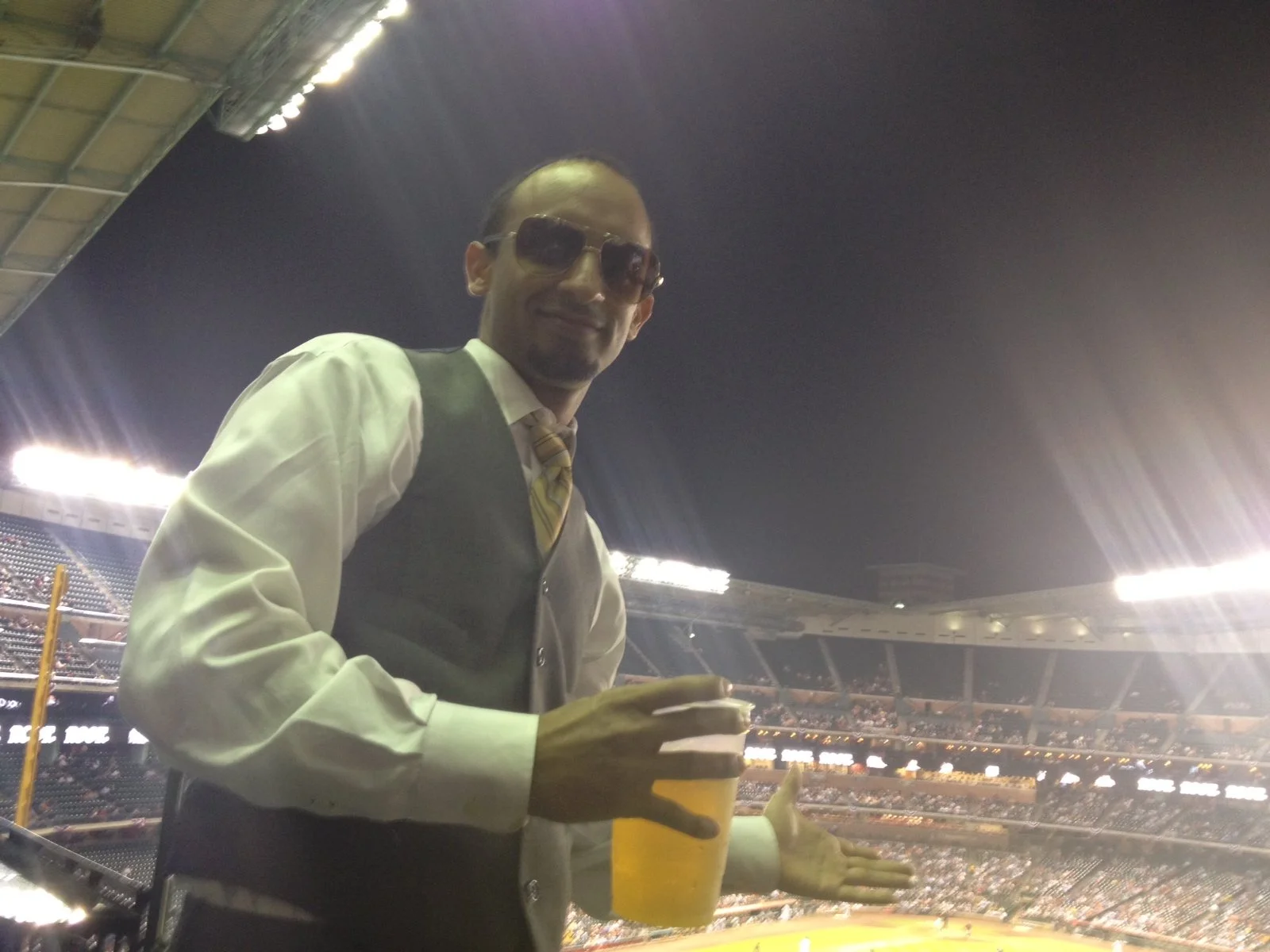 Take me out to the ballgame but I'm wearing a three-piece.