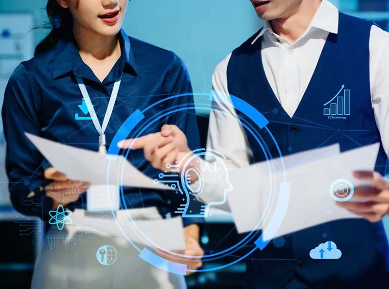 Business team using AI technology and data analytics tools to review documents and improve operational efficiency.