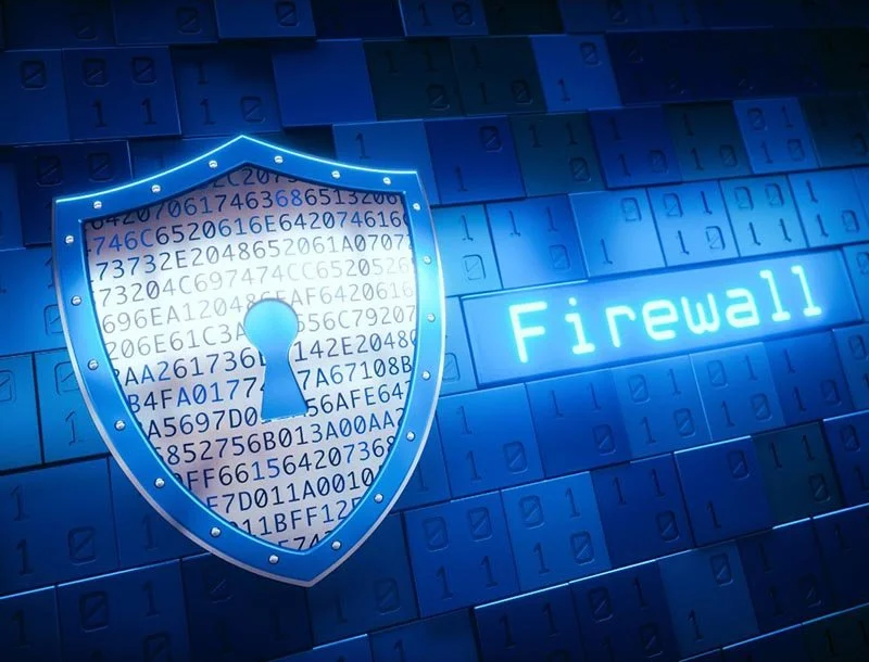 Blue digital shield icon with binary code protecting a system, next to the word ‘Firewall’ on a cyber security–themed background.