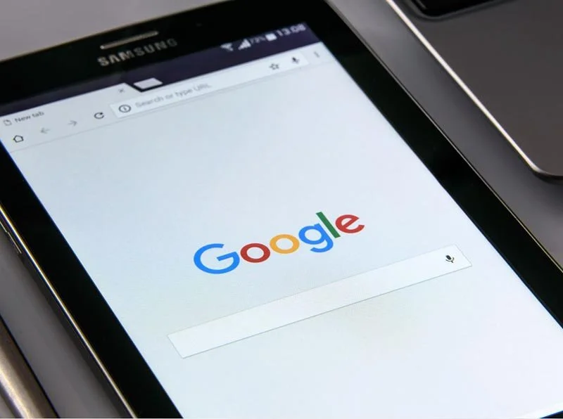 Google search homepage displayed on a Samsung tablet screen.