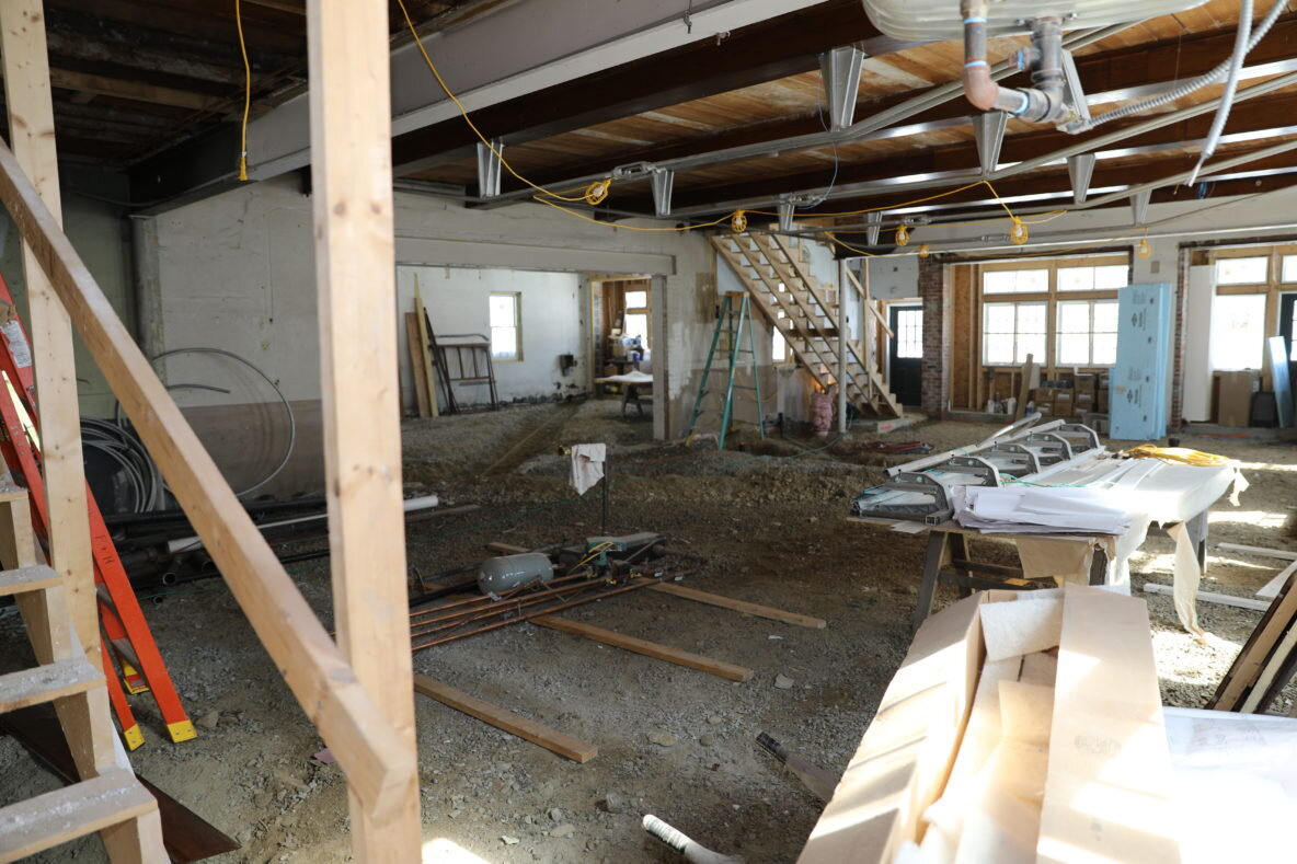 VIEW FROM THE BACK OF THE DINING ROOM WITH A VIEW OF THE LOUNGE