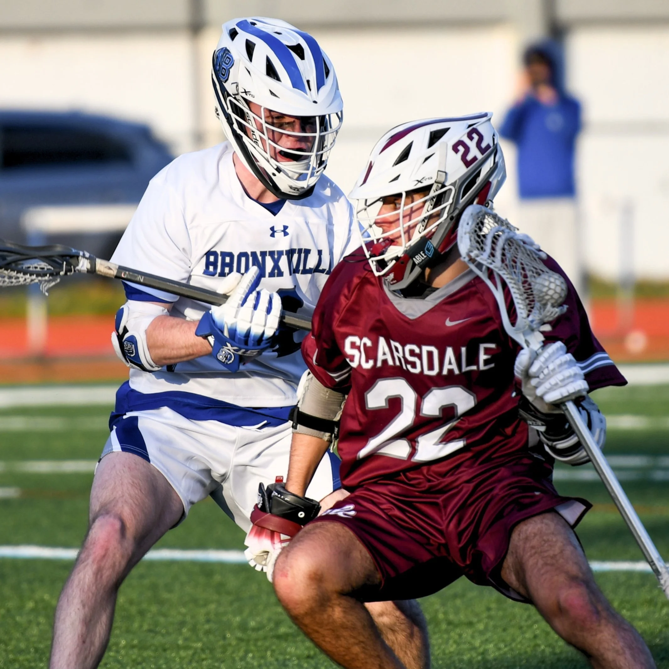 lax player wearing able athletics lax strap