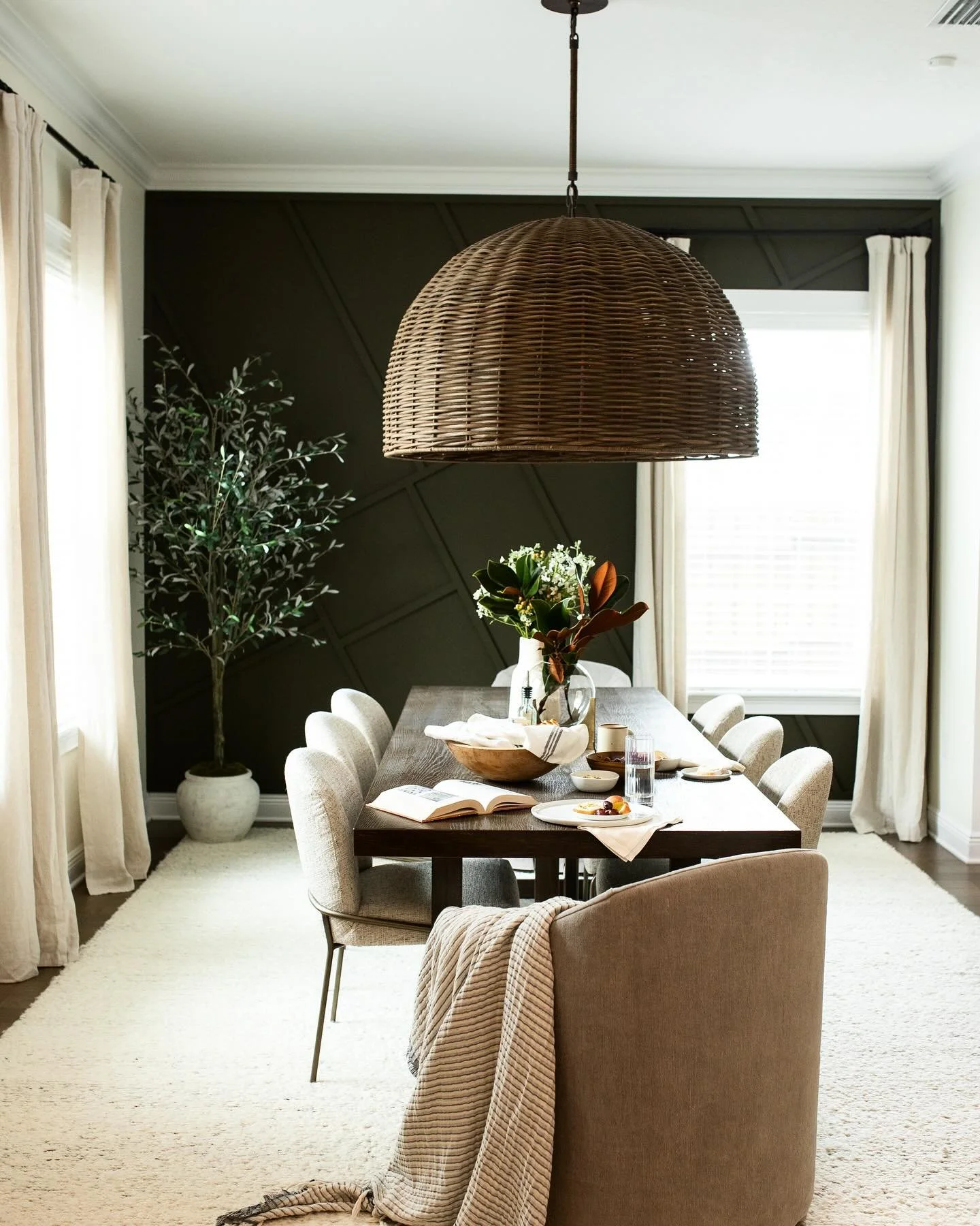 My favorite dining room tip? Swap out your head chairs for ones that complement the space. They not only bring balance but also serve as an anchor, enhancing the room&rsquo;s symmetry. They are oh-so-comfy and, paired with that statement, textural li