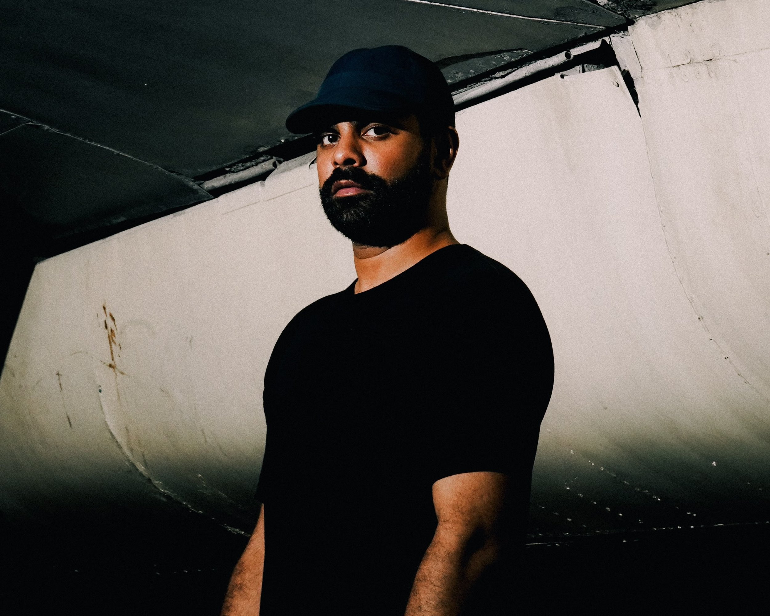 Ahadadream dressed in a black cap, photographed by Marshall Lawrence