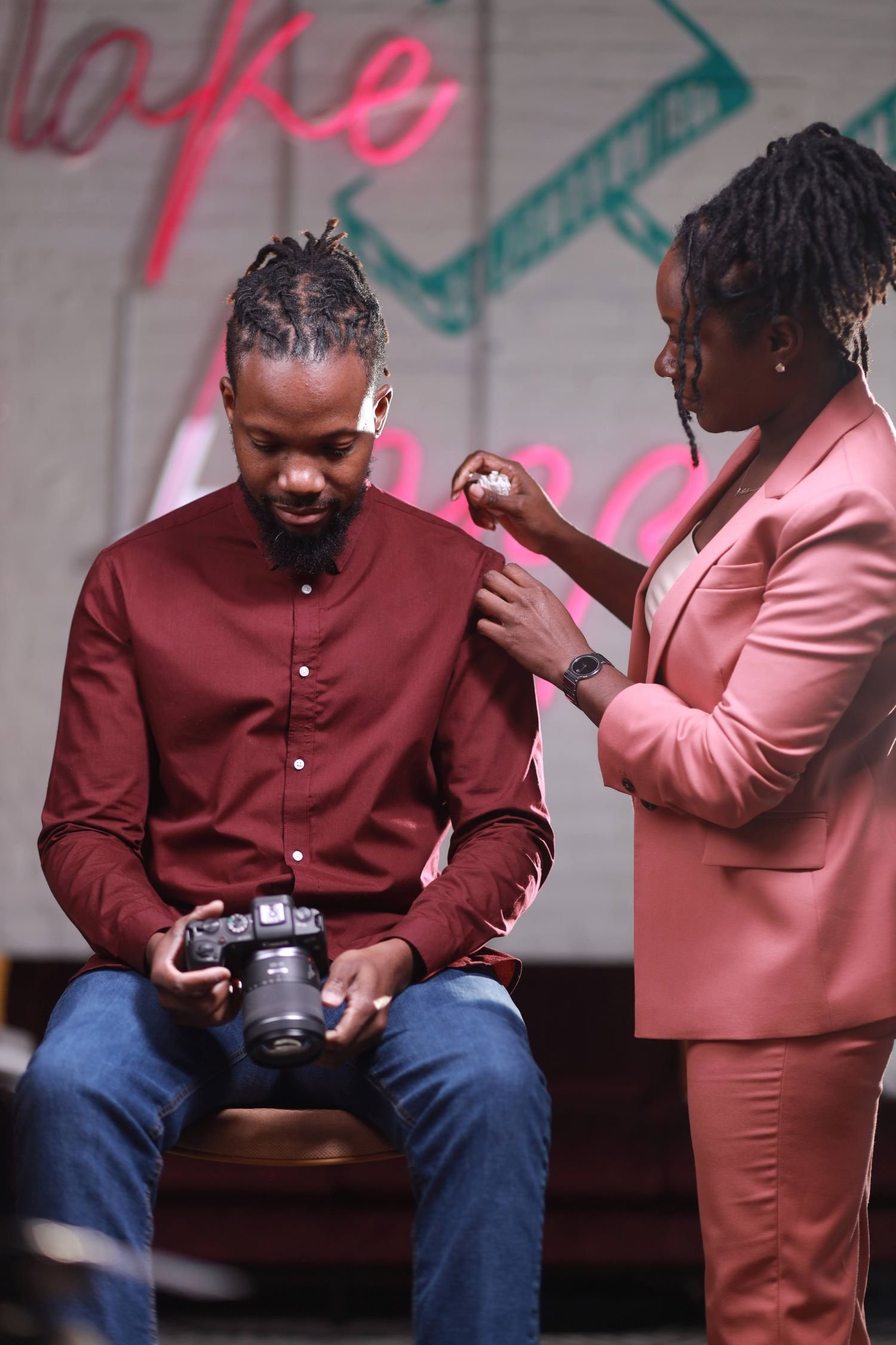 web designer touching client shirt