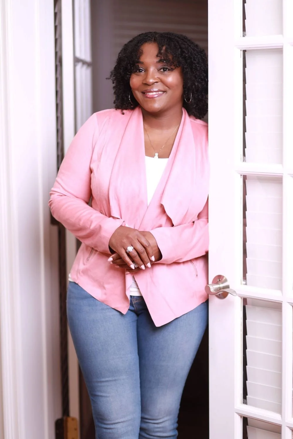 female therapist standing in doorway