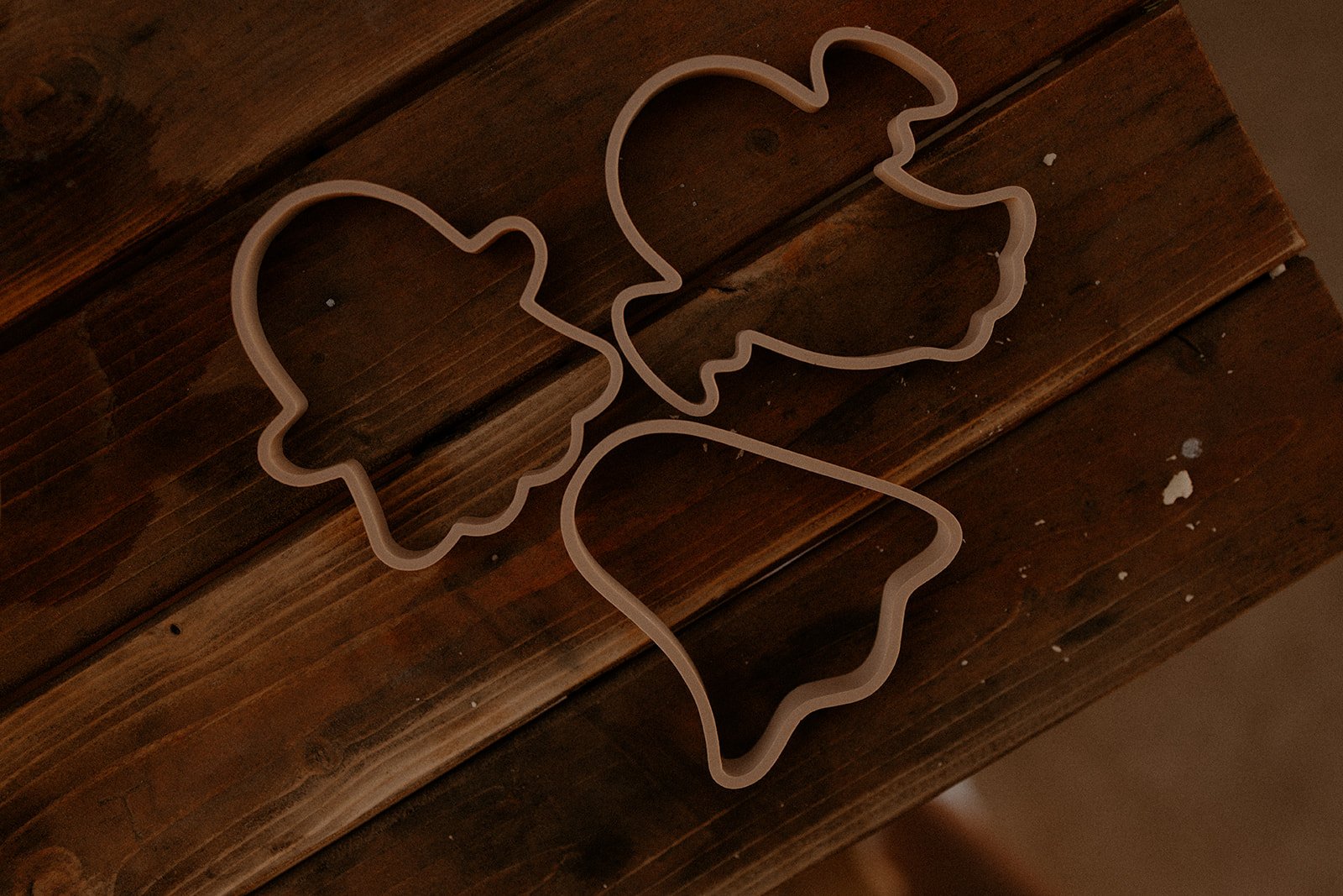 Three ghost cutter outlines with various shapes and sizes for sensory play