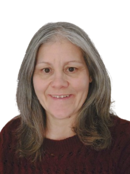A woman with shoulder-length gray hair smiling, wearing a maroon sweater, against a plain white background.