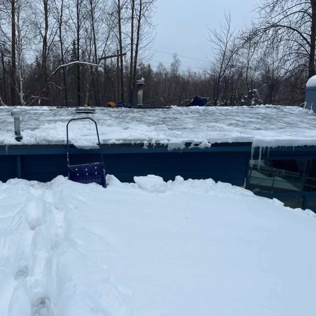 Are you concerned with the snow or ice dams on a roof? We can help! Give us a call at 907-717-4198.