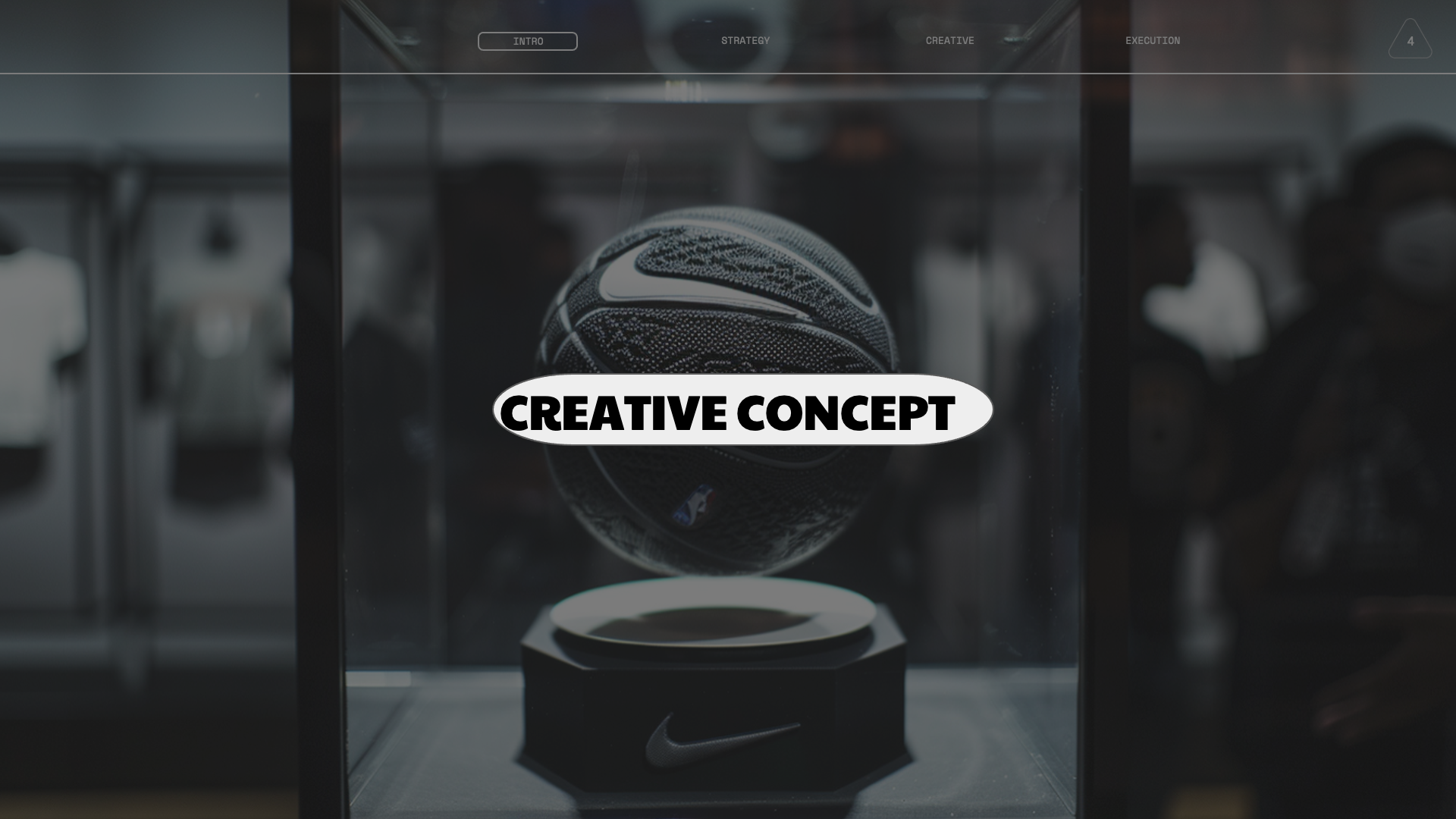 A baseball with black and white designs inside a glass display case with the words "CREATIVE CONCEPT" overlaid.