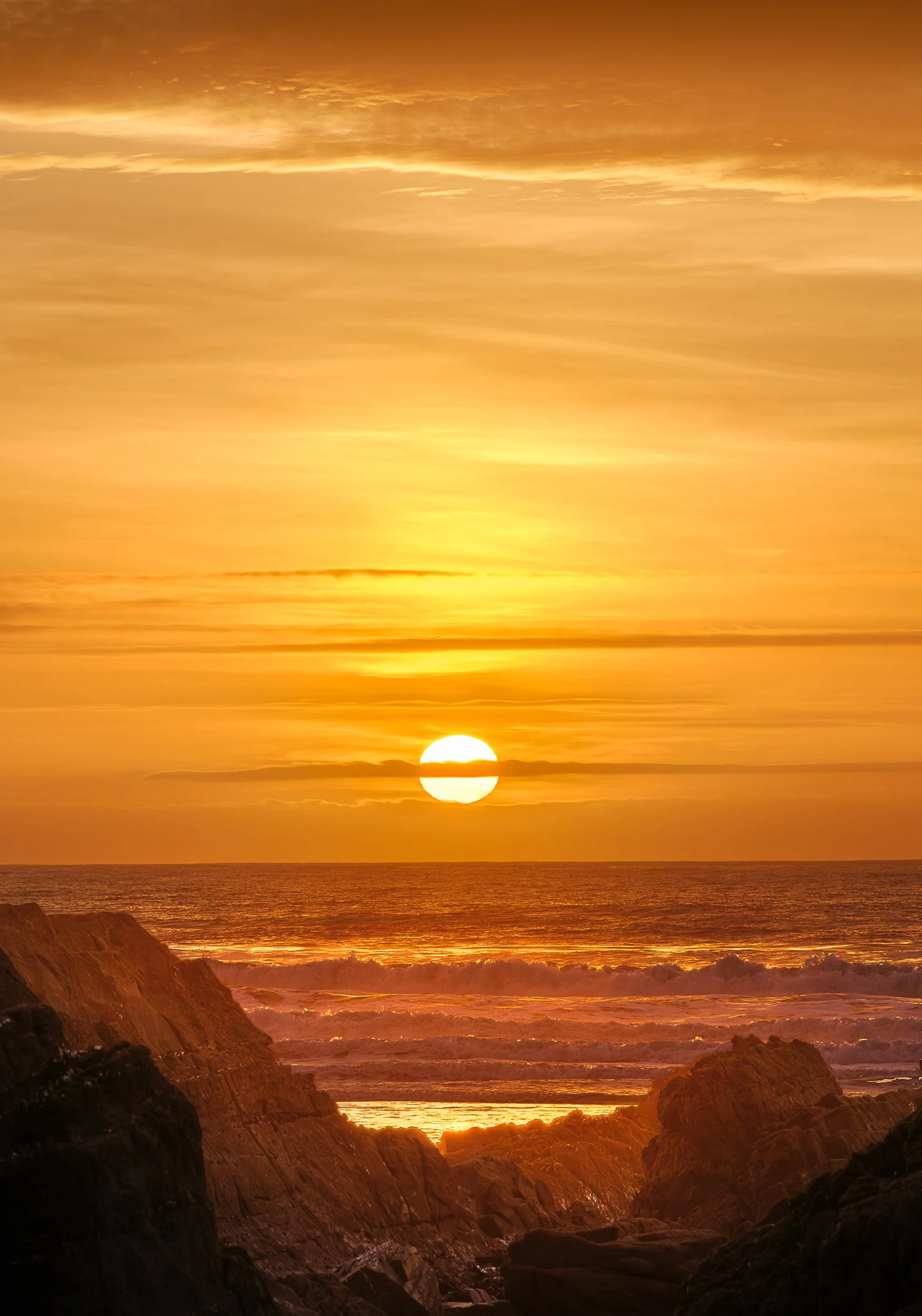 Sunset on Sandymouth beach