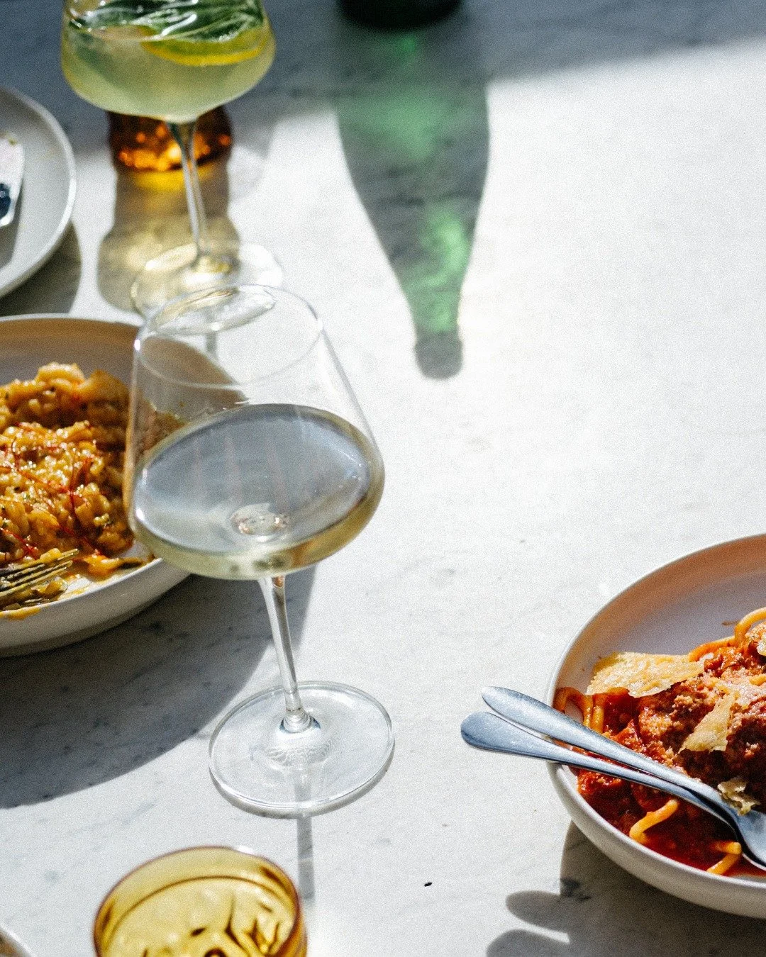 A table set, a moment waiting.
Glasses poured, plates shared, conversation unfolding as it should, unhurried, effortless, and exactly where you&rsquo;re meant to be.

Join us at the table | Bookings recommended.
