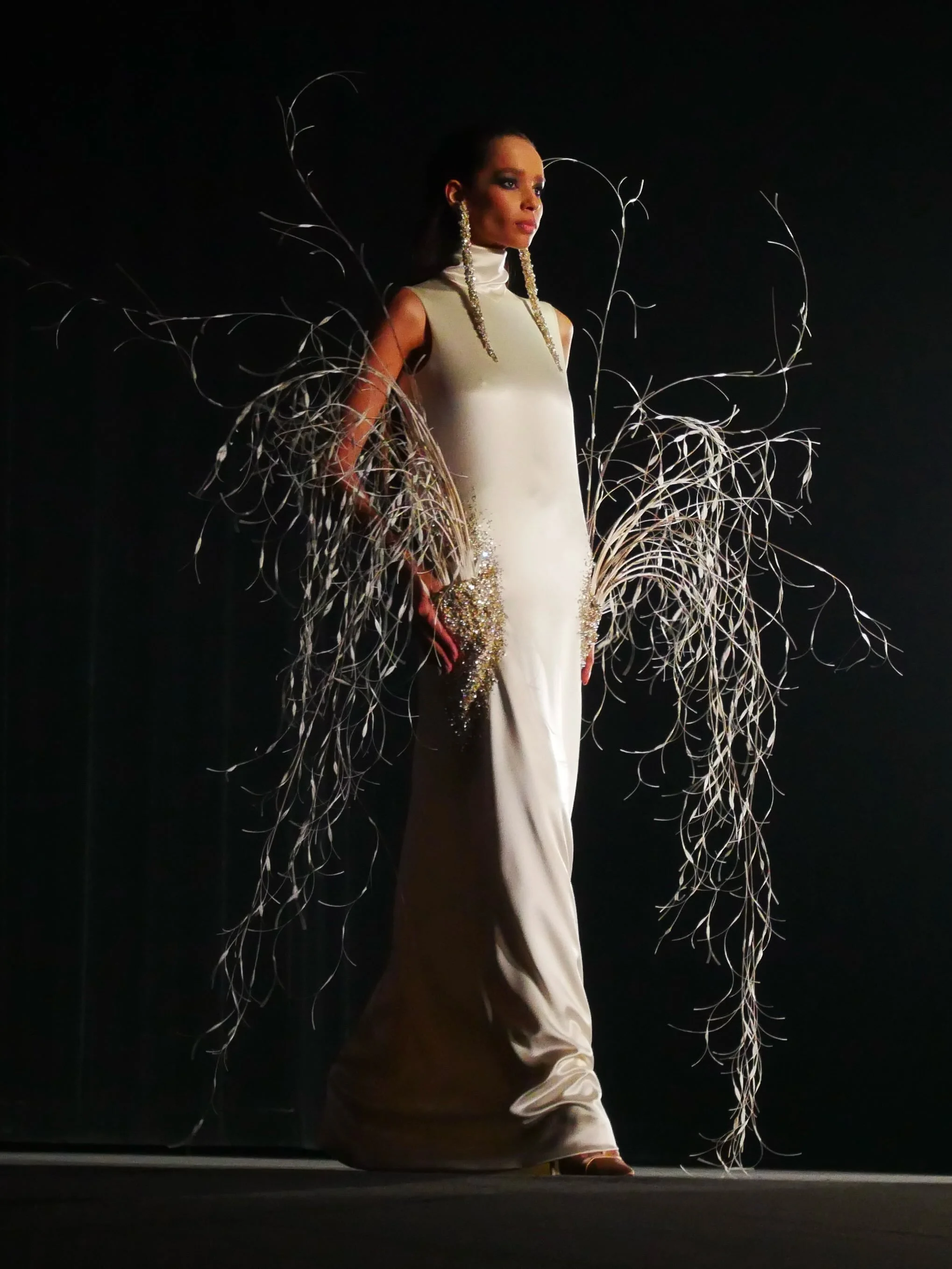 St&eacute;phane Rolland celebrated the legendary Egyptian-born singer Dalida with his Autumn/Winter 2026 Haute Couture collection. Inspired by the timeless elegance of her signature white gowns, he created a series of poetic homages to her enduring s