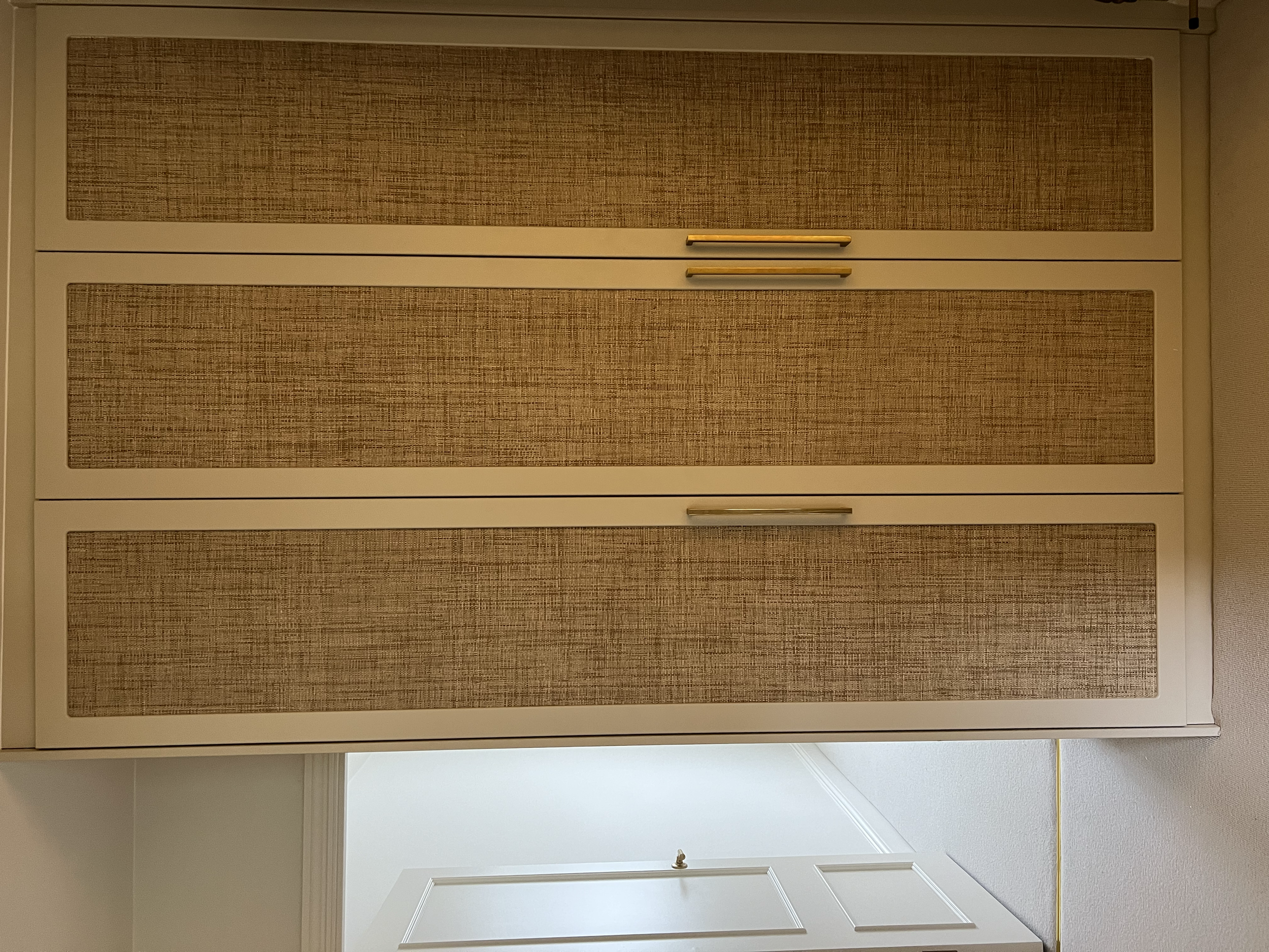 “Bespoke wardrobe design with custom shelving and hanging space in modern family home.”