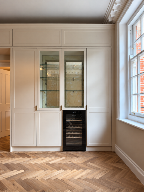 Generated image: Elegant Cream Cabinetry and Wine Display.PNG