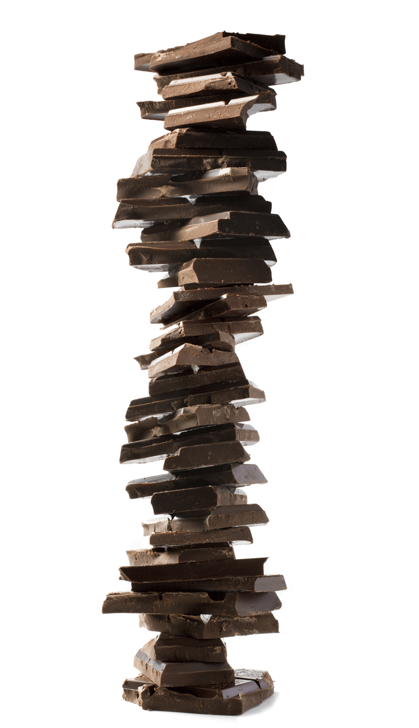 gif of a long tall stack of broken chocolate leaning side to side. Studio photographer chris rochelle