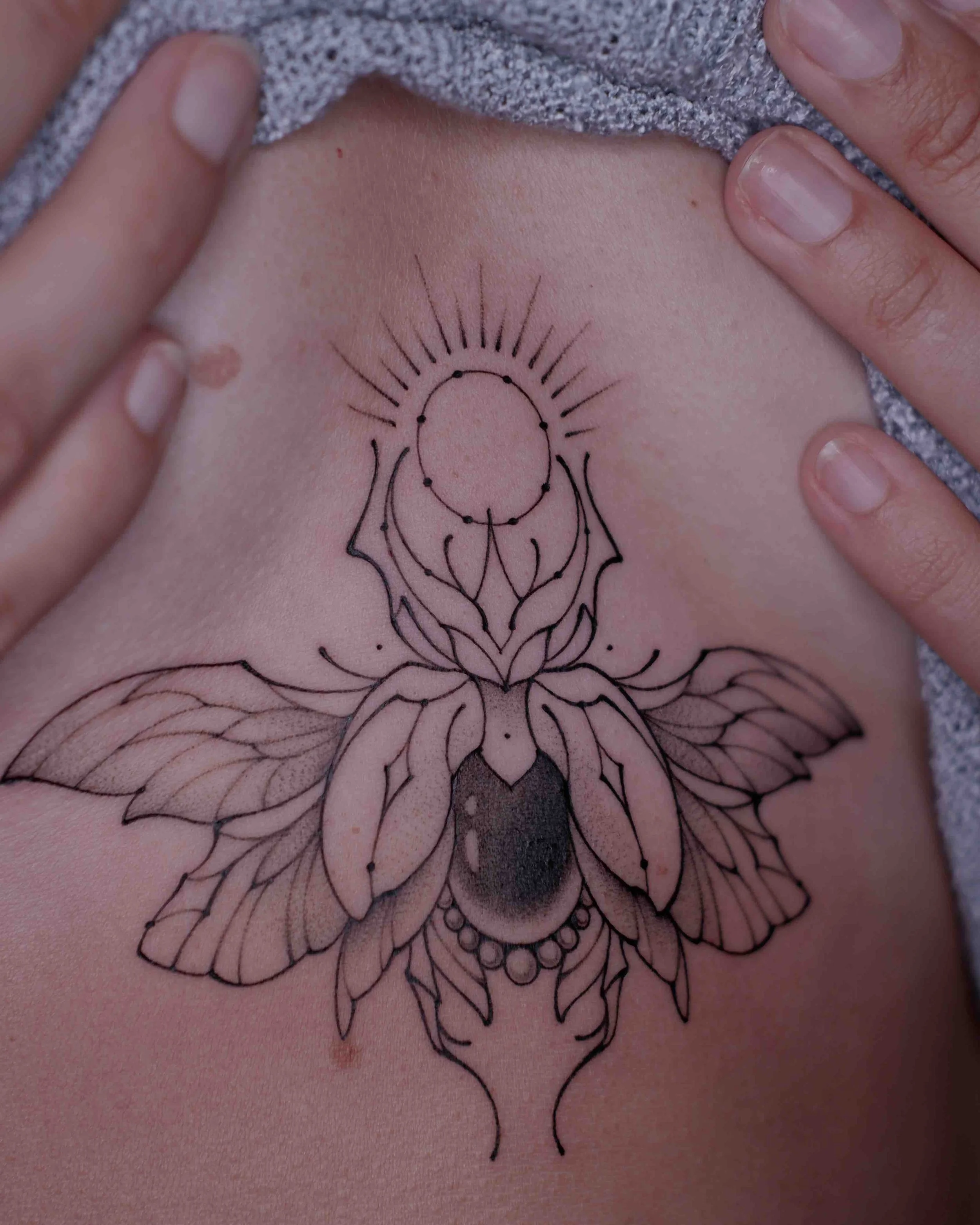 Sternumtattoo.fineline.dotwork.jpeg