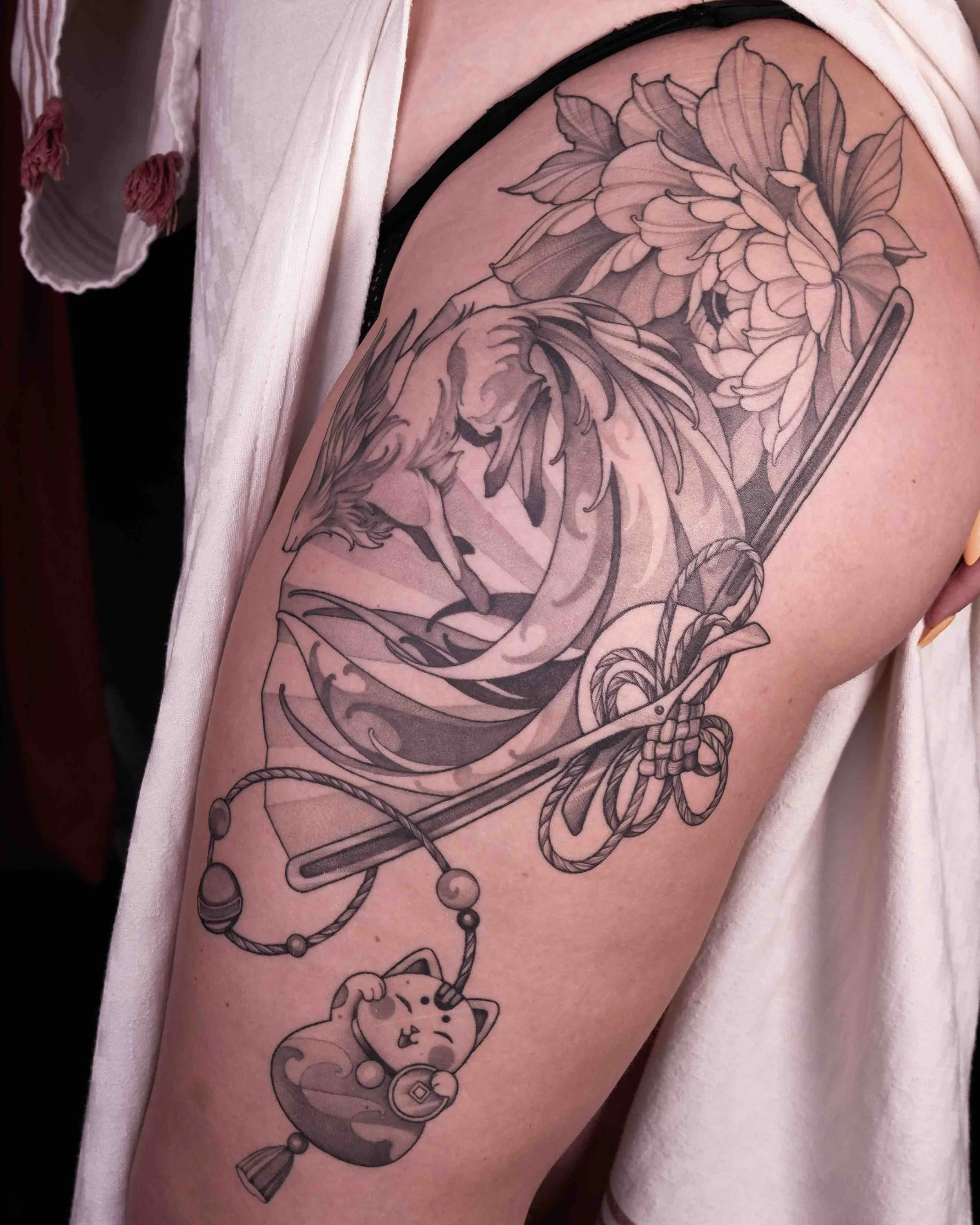 Bovenbeen floraldesigntattoo.jpeg