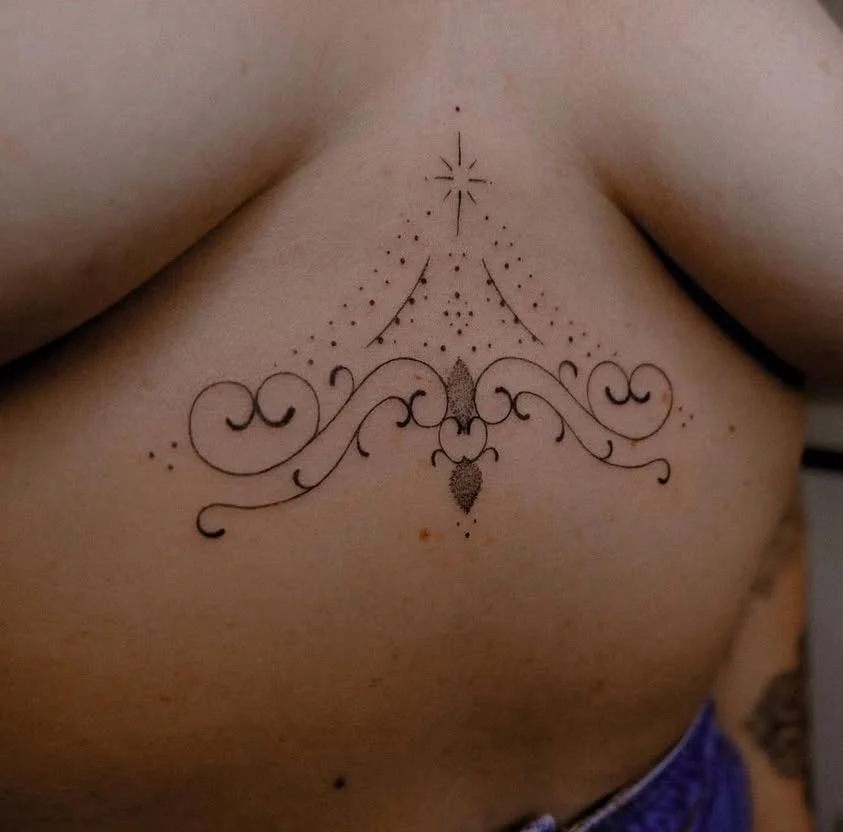 Fine-line-sternum-tattoo.jpeg